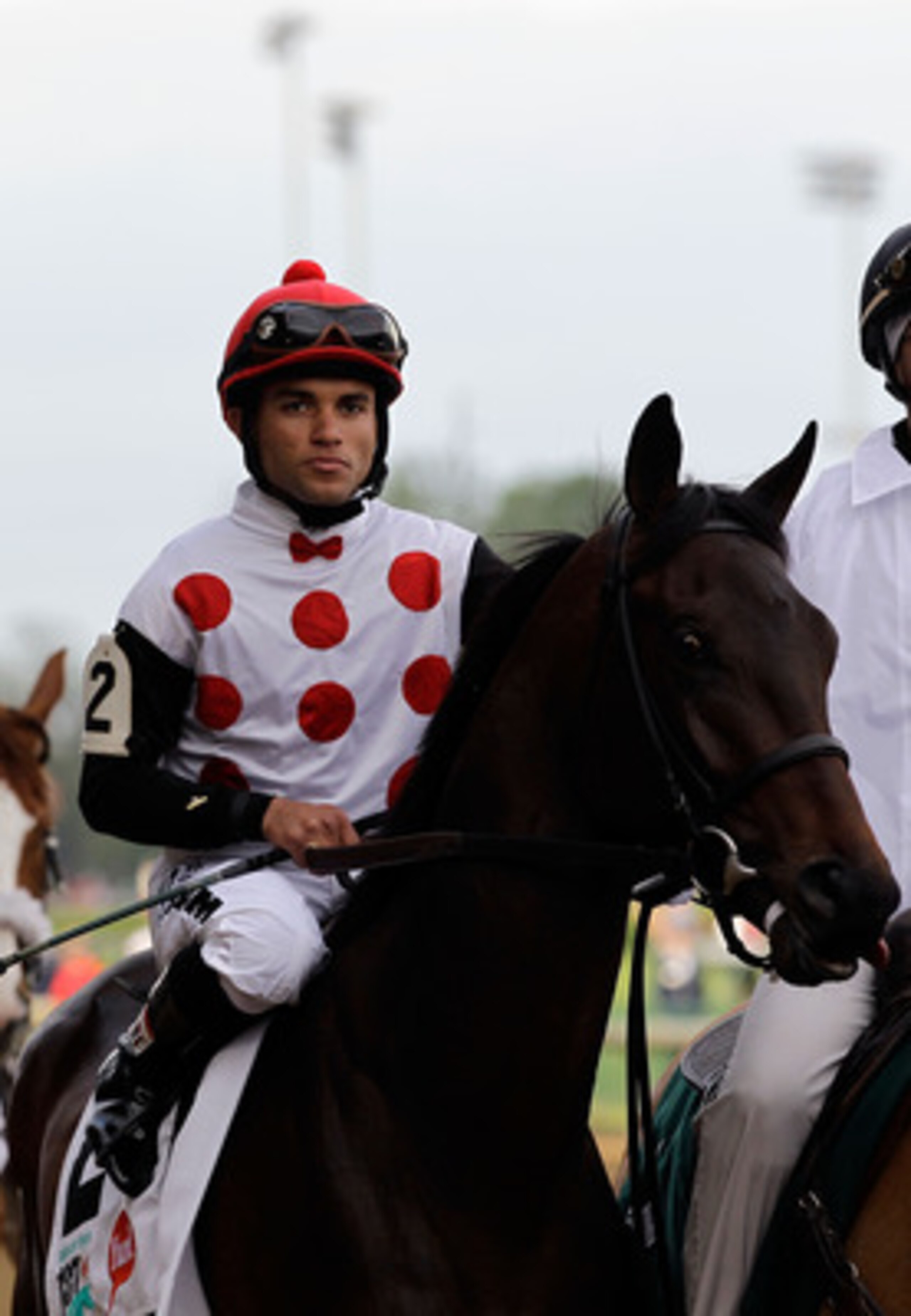 LOUISVILLE, KY - MAY 07: Jockey Joel Rosario, riding Brilliant Speed #2, is escourted onto the track by an outrider for the running of the 137th Kentucky Derby at Churchill Downs on May 7, 2011 in Louisville, Kentucky. (Photo by Rob Carr/Getty Images) LOUISVILLE, KY - MAY 07: Jockey Joel Rosario, riding Brilliant Speed #2, is escourted onto the track by an outrider for the running of the 137th Kentucky Derby at Churchill Downs on May 7, 2011 in Louisville, Kentucky. (Photo by Rob Carr/Getty Images)
