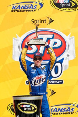 KANSAS CITY, KS - JUNE 05:  Brad Keselowski, driver of the #2 Miller Lite Dodge, celebrates in Victory Lane after winning the NASCAR Sprint Cup Series STP 400 at Kansas Speedway on June 5, 2011 in Kansas City, Kansas.  (Photo by Geoff Burke/Getty Images f