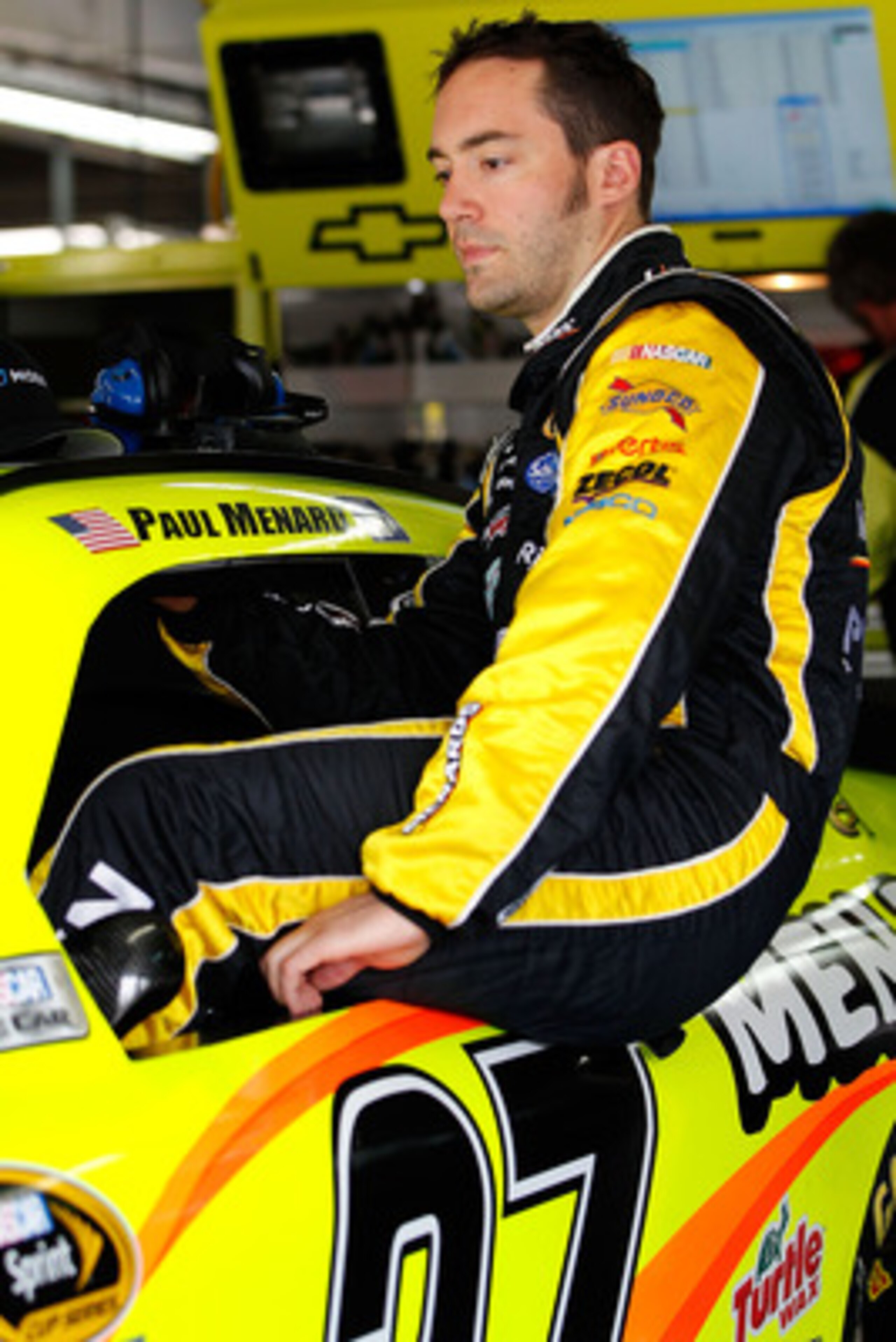CHARLOTTE, NC - MAY 28: Paul Menard, driver of the #27 Moen/Menards Chevrolet, climbs into his car prior to practice for the NASCAR Sprint Cup Series Coca-Cola 600 at Charlotte Motor Speedway on May 28, 2011 in Charlotte, North Carolina. (Photo by Geoff CHARLOTTE, NC - MAY 28: Paul Menard, driver of the #27 Moen/Menards Chevrolet, climbs into his car prior to practice for the NASCAR Sprint Cup Series Coca-Cola 600 at Charlotte Motor Speedway on May 28, 2011 in Charlotte, North Carolina. (Photo by Geoff