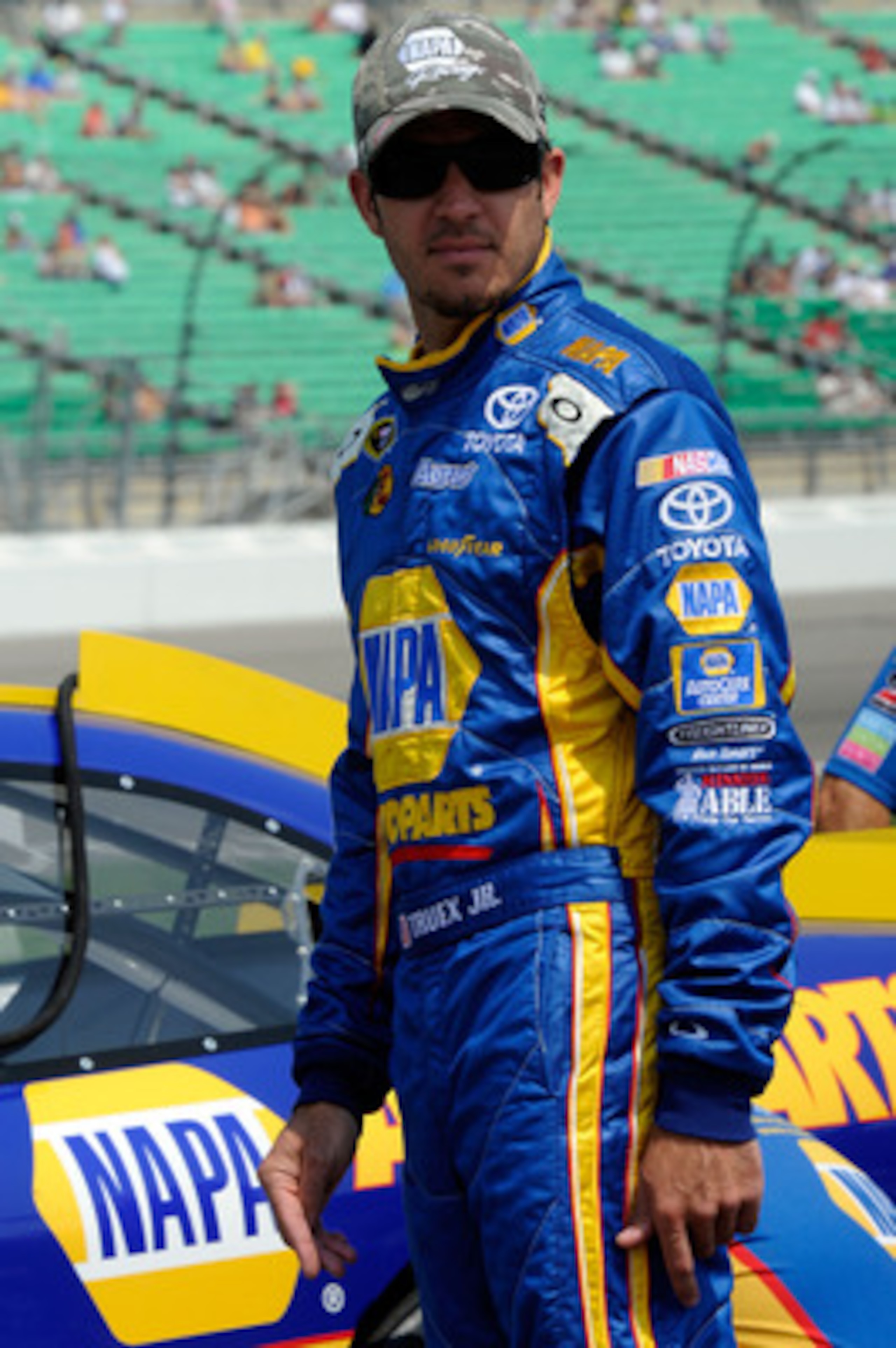 KANSAS CITY, KS - JUNE 04: Martin Truex Jr., driver of the #56 NAPA Auto Parts Toyota, stands on the grid during qualifying for the NASCAR Sprint Cup Series STP 400 at Kansas Speedway on June 4, 2011 in Kansas City, Kansas. (Photo by John Harrelson/Gett KANSAS CITY, KS - JUNE 04: Martin Truex Jr., driver of the #56 NAPA Auto Parts Toyota, stands on the grid during qualifying for the NASCAR Sprint Cup Series STP 400 at Kansas Speedway on June 4, 2011 in Kansas City, Kansas. (Photo by John Harrelson/Gett