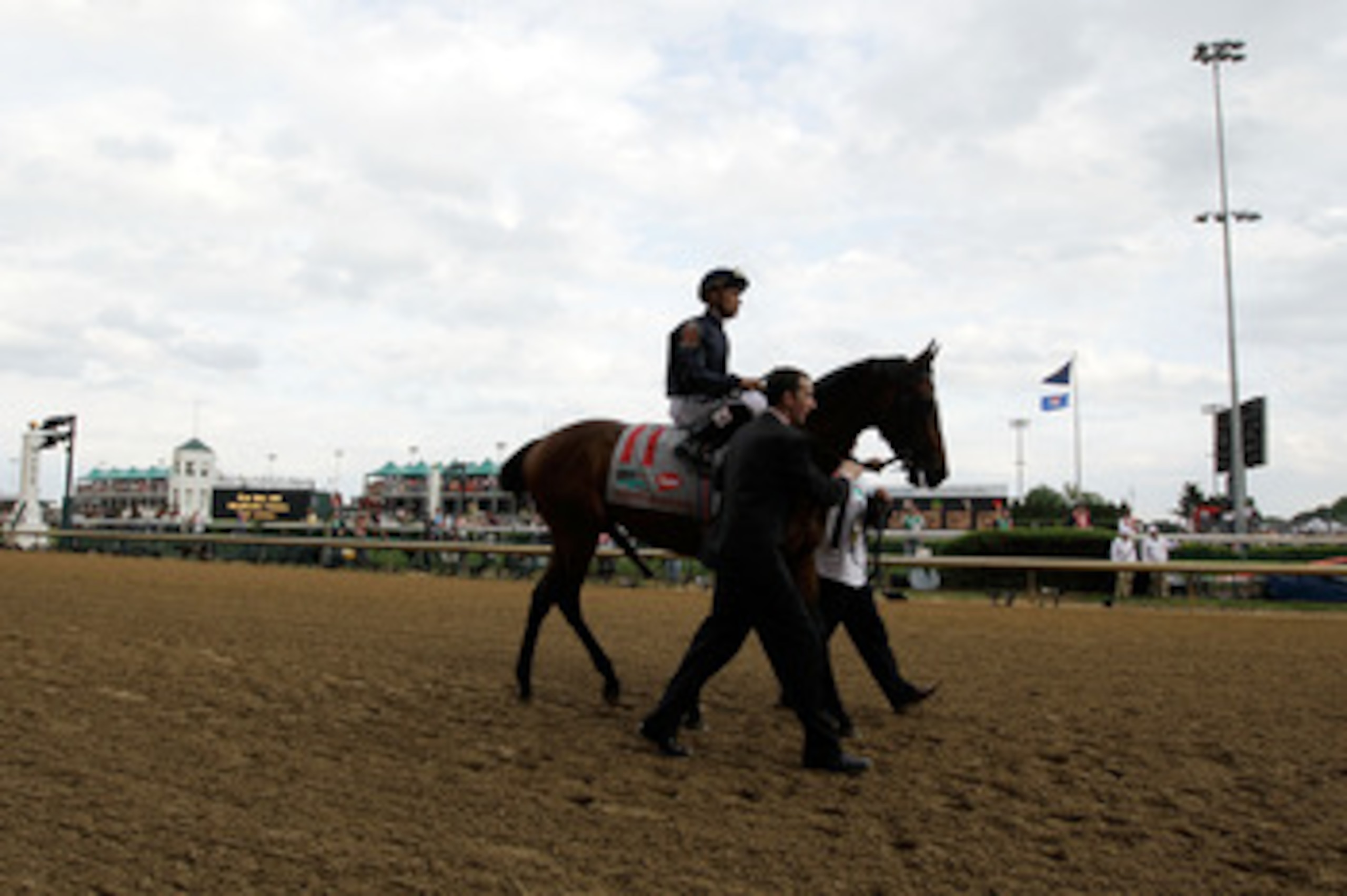 LOUISVILLE, KY - MAY 07: Jockey Garrett Gomez, riding Master of Hounds #11, is escourted onto the track for the running of the 137th Kentucky Derby at Churchill Downs on May 7, 2011 in Louisville, Kentucky. (Photo by Rob Carr/Getty Images) LOUISVILLE, KY - MAY 07: Jockey Garrett Gomez, riding Master of Hounds #11, is escourted onto the track for the running of the 137th Kentucky Derby at Churchill Downs on May 7, 2011 in Louisville, Kentucky. (Photo by Rob Carr/Getty Images)