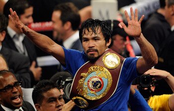 LAS VEGAS, NV - MAY 07:  Manny Pacquiao of the Philippines celebrates after his unanimous decision victory against Shane Mosley in the WBO welterweight title fight at MGM Grand Garden Arena on May 7, 2011 in Las Vegas, Nevada.  (Photo by Ethan Miller/Gett