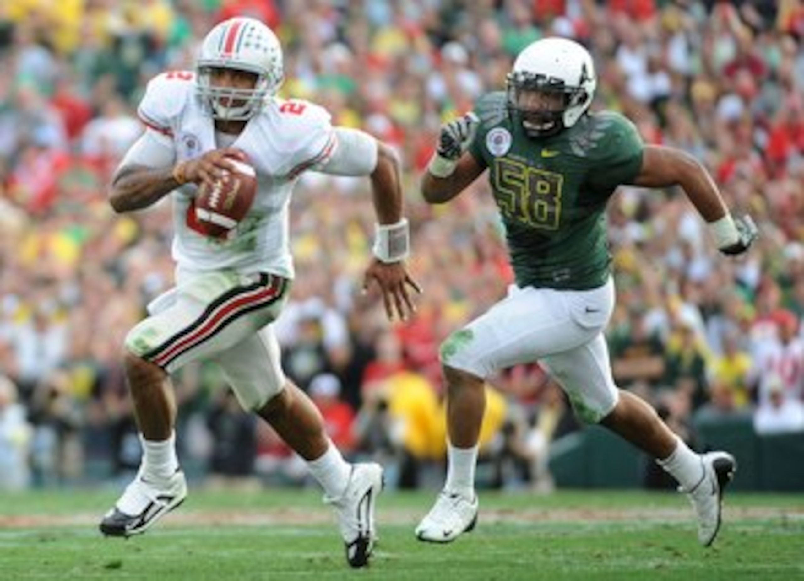 PASADENA, CA - JANUARY 01:  Quarterback Terrelle Pryor #2 of the Ohio State Buckeyes runs with the ball against the Oregon Ducks during the 96th Rose Bowl game on January 1, 2010 in Pasadena, California.  (Photo by Harry How/Getty Images)