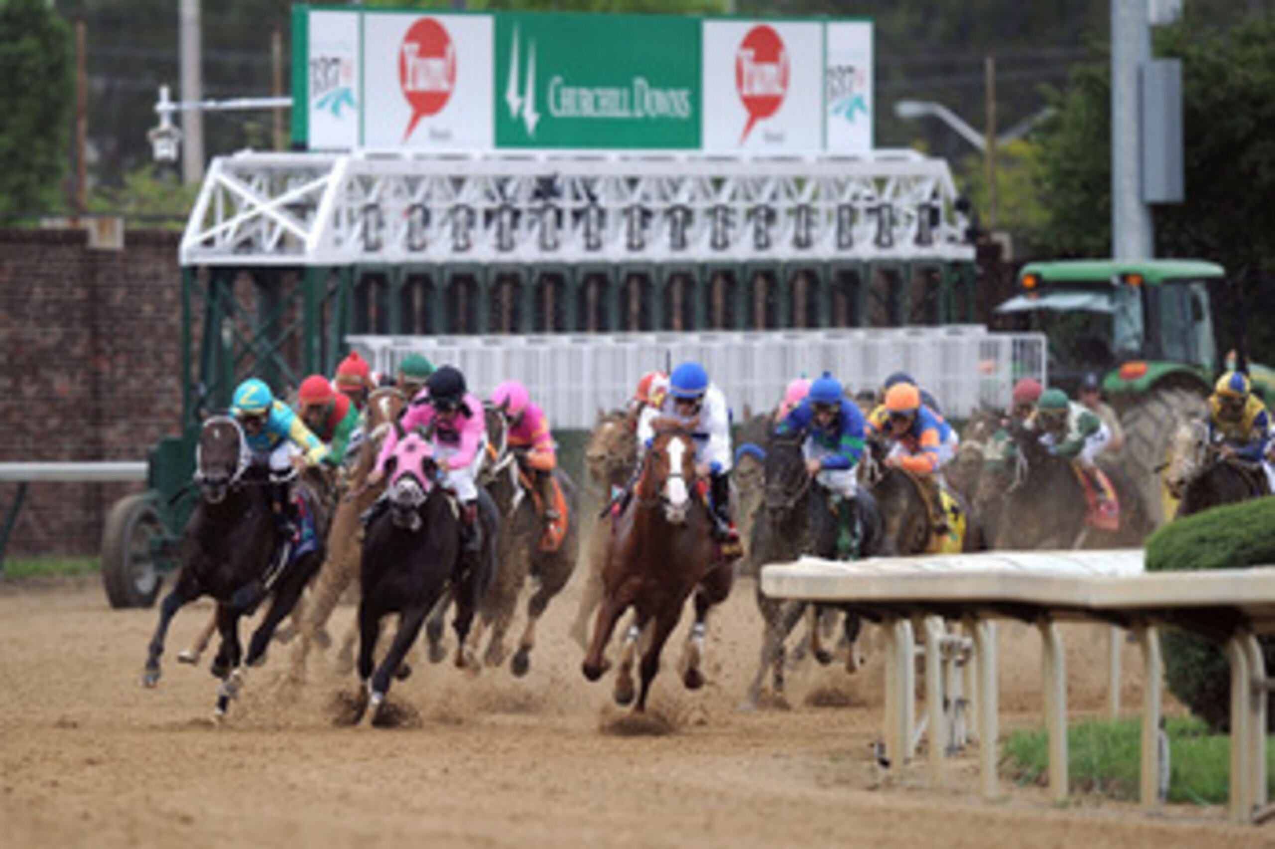LOUISVILLE, KY - MAY 07: (L-R) Jockeys Corey Nakatani, riding Nehro #19, Patrick Valenzuela, riding Comma to the Top #6 and Jesus L. Castanon, riding Shackleford #14, lead the field through turn four during the 137th Kentucky Derby at Churchill Downs on LOUISVILLE, KY - MAY 07: (L-R) Jockeys Corey Nakatani, riding Nehro #19, Patrick Valenzuela, riding Comma to the Top #6 and Jesus L. Castanon, riding Shackleford #14, lead the field through turn four during the 137th Kentucky Derby at Churchill Downs on