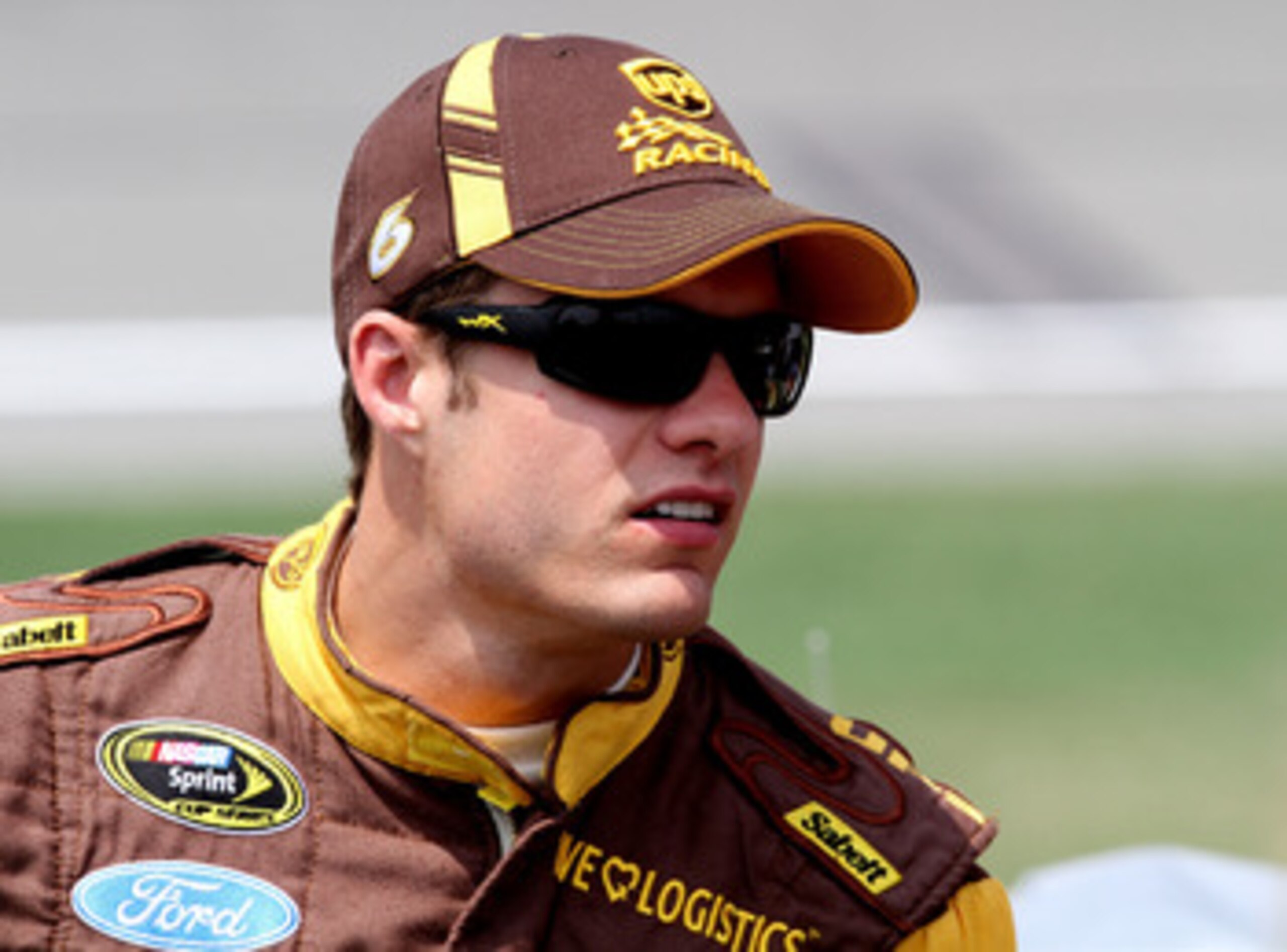 KANSAS CITY, KS - JUNE 04: David Ragan, driver of the #6 UPS Ford, stands on the grid during qualifying for the NASCAR Sprint Cup Series STP 400 at Kansas Speedway on June 4, 2011 in Kansas City, Kansas. (Photo by Jerry Markland/Getty Images for NASCAR) KANSAS CITY, KS - JUNE 04: David Ragan, driver of the #6 UPS Ford, stands on the grid during qualifying for the NASCAR Sprint Cup Series STP 400 at Kansas Speedway on June 4, 2011 in Kansas City, Kansas. (Photo by Jerry Markland/Getty Images for NASCAR)