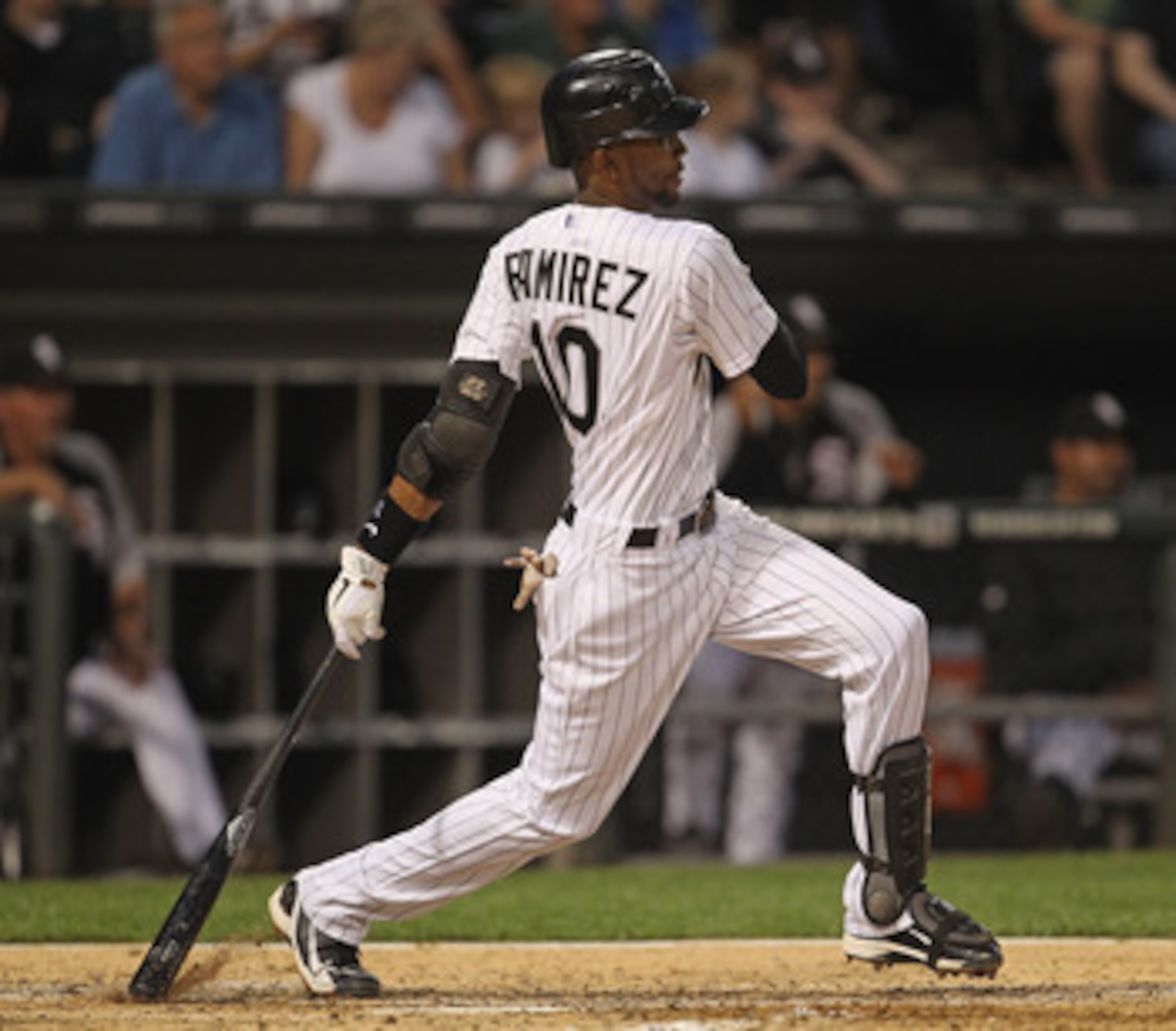 CHICAGO, IL - JUNE 06:  Alexei Ramirez #10 of the Chicago White Sox hits the ball against the Seattle Mariners at U.S. Cellular Field on June 6, 2011 in Chicago, Illinois. The White Sox defeated the Mariners 3-1.  (Photo by Jonathan Daniel/Getty Images)