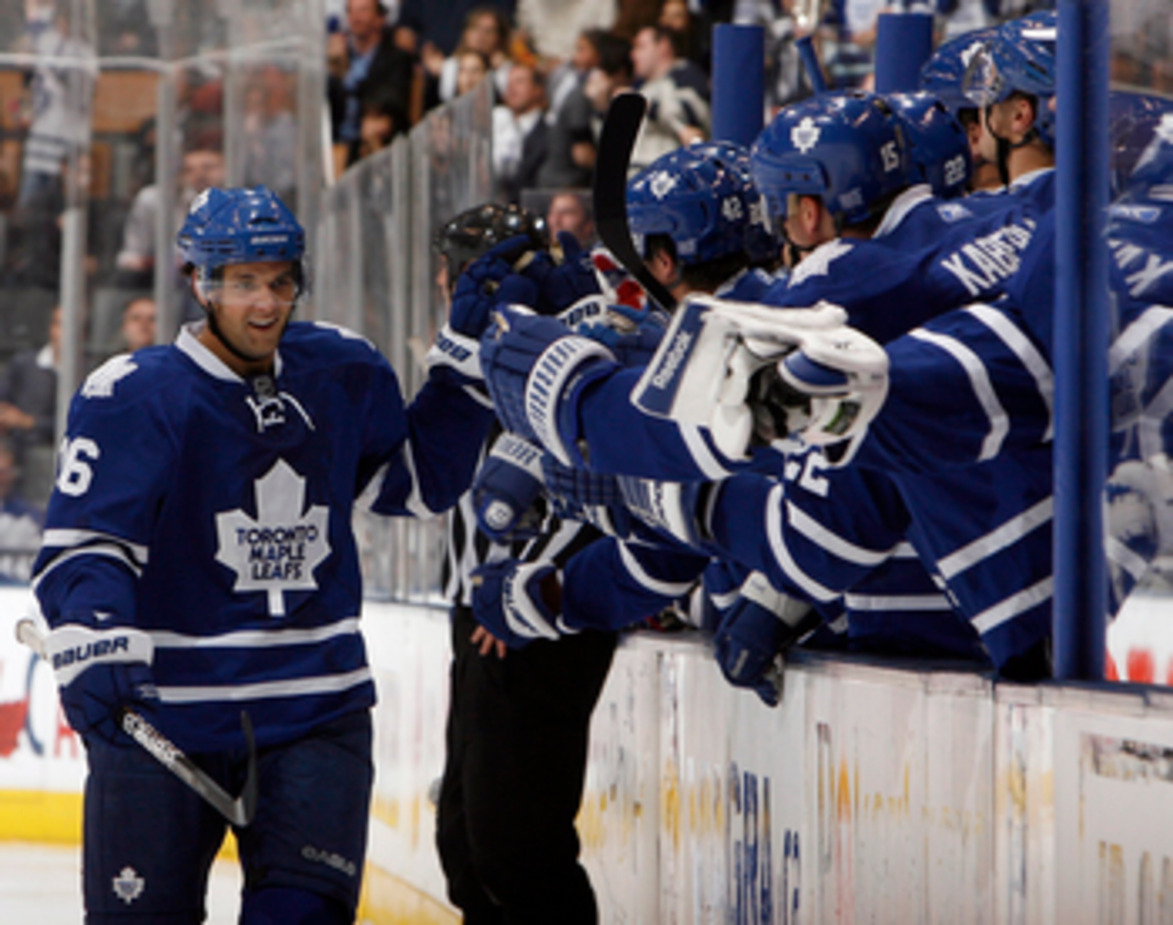 TORONTO - OCTOBER 7: Clarke MacArthur #16 of the Toronto Maple Leafs celebrates his goal against the Montreal Canadiens during a regular season NHL game against the Toronto Maple Leafs at the Air Canada Centre October 7, 2010 in Toronto, Ontario, Canada. TORONTO - OCTOBER 7: Clarke MacArthur #16 of the Toronto Maple Leafs celebrates his goal against the Montreal Canadiens during a regular season NHL game against the Toronto Maple Leafs at the Air Canada Centre October 7, 2010 in Toronto, Ontario, Canada.
