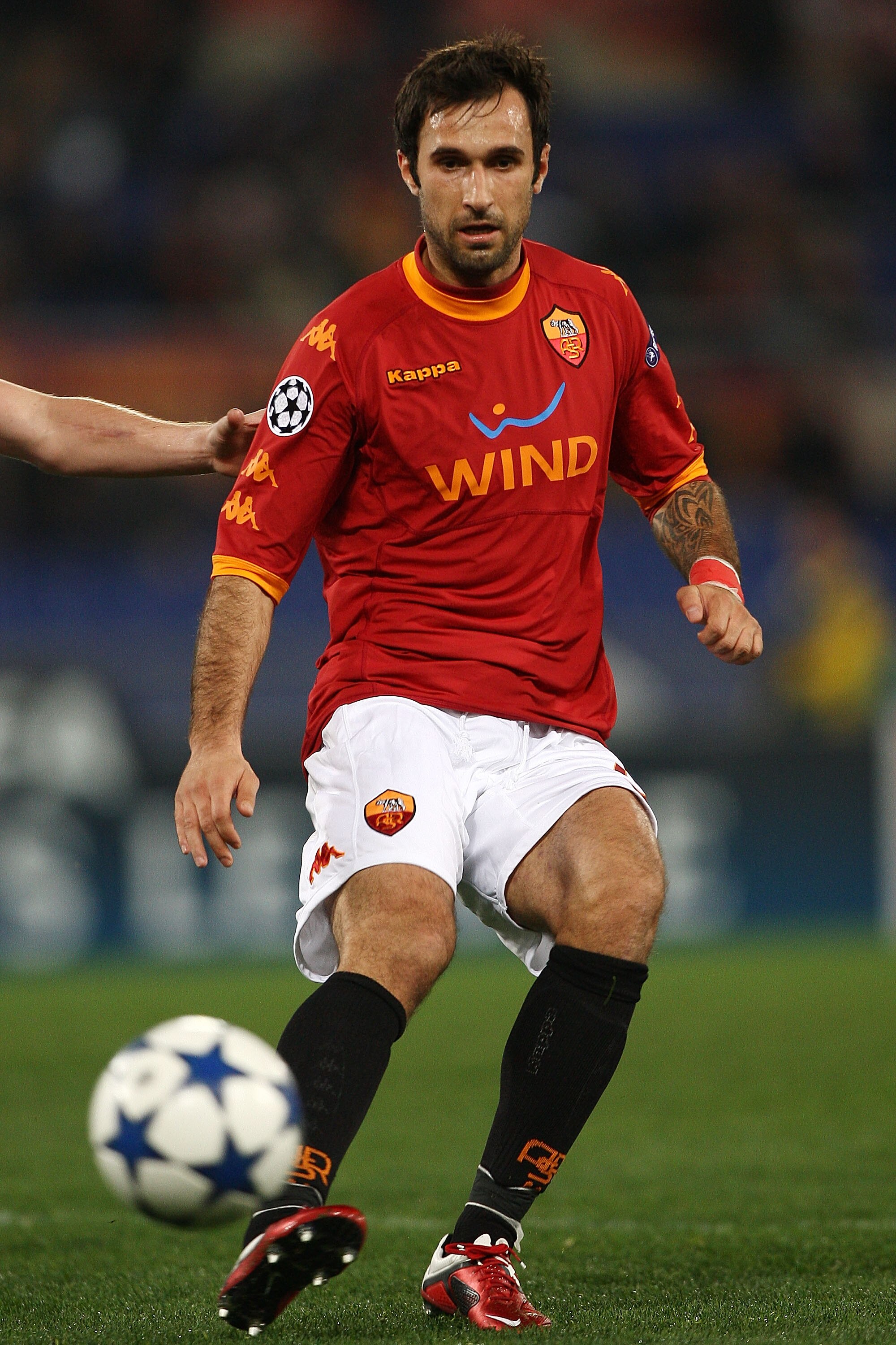 ROME, ITALY - FEBRUARY 16:  Mirko Vucinic of AS Roma in action during the UEFA Champions League round of 16 first leg match between AS Roma and Shakhtar Donetsk at Stadio Olimpico on February 16, 2011 in Rome, Italy.  (Photo by Paolo Bruno/Getty Images)