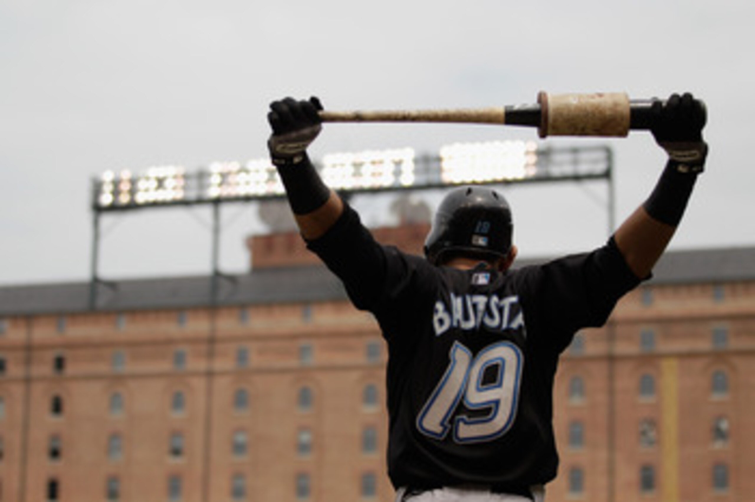 BALTIMORE, MD - JUNE 05:  Jose Bautista #19 of the Toronto Blue Jays waits to bat against the Baltimore Orioles at Oriole Park at Camden Yards on June 5, 2011 in Baltimore, Maryland.  (Photo by Rob Carr/Getty Images)