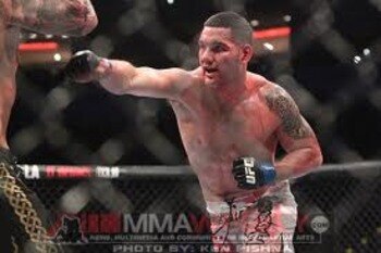 Chris Weidman delivering a straight right hand