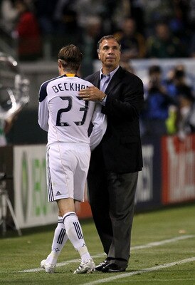 CARSON, CA - MAY 21:  David Beckham #23 of the Los Angeles Galaxyis greeted by head coach Bruce Arena as he comes out of the game with Chivas USA at The Home Depot Center on May 21, 2011 in Carson, California.  The Galaxy won 1-0.  (Photo by Stephen Dunn/