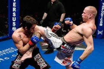 Donald Cerrone delivering a vicious knee