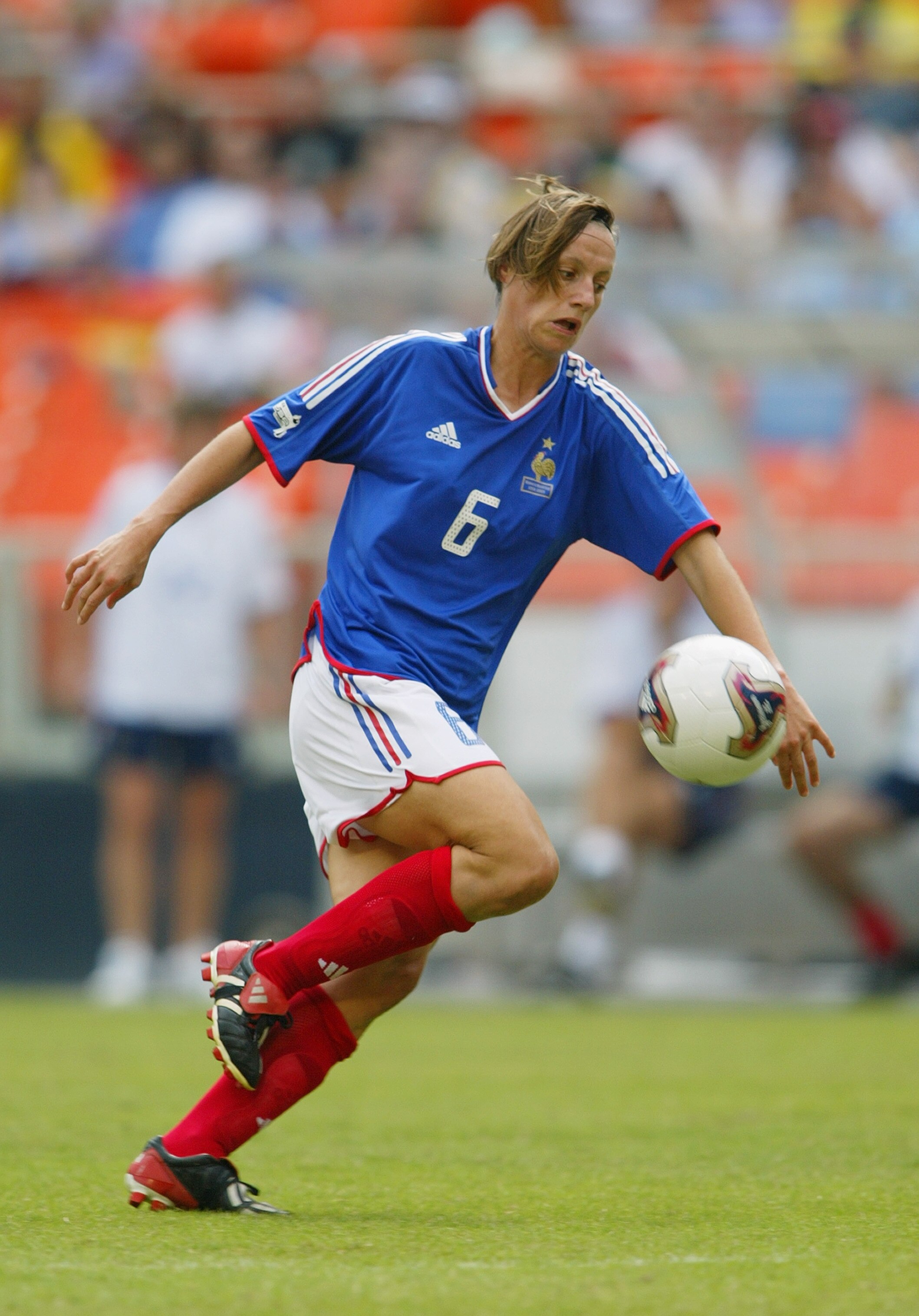 WASHINGTON - SEPTEMBER 27:  Midfielder Sandrine Soubeyrand #6 of France advances the ball against Brazil during the FIFA Women's World Cup at RFK Stadium on September 27, 2003 in Washington, D.C.  France tied Brazil 1-1.  (Photo by Jamie Squire/Getty Imag