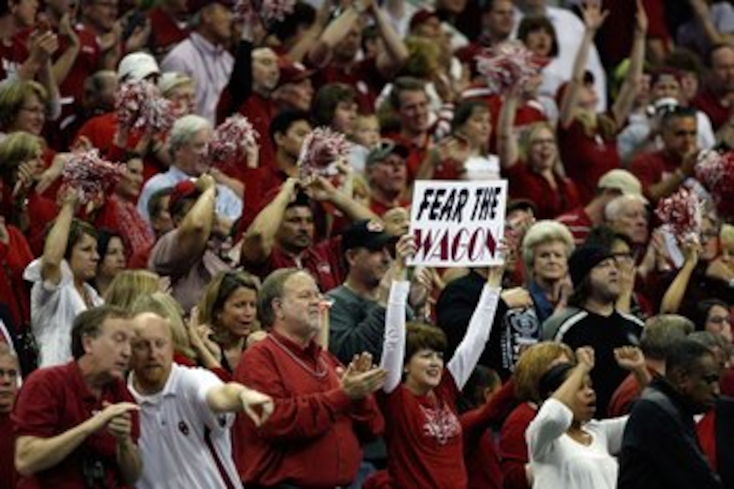 MEMPHIS, TN - MARCH 27:  Oklahoma Sooners fans cheer on their team against the Syracuse Orange during the NCAA Men's Basketball Tournament South Regionals at the FedExForum on March 27, 2009 in Memphis, Tennessee.  (Photo by Joe Murphy/Getty Images)