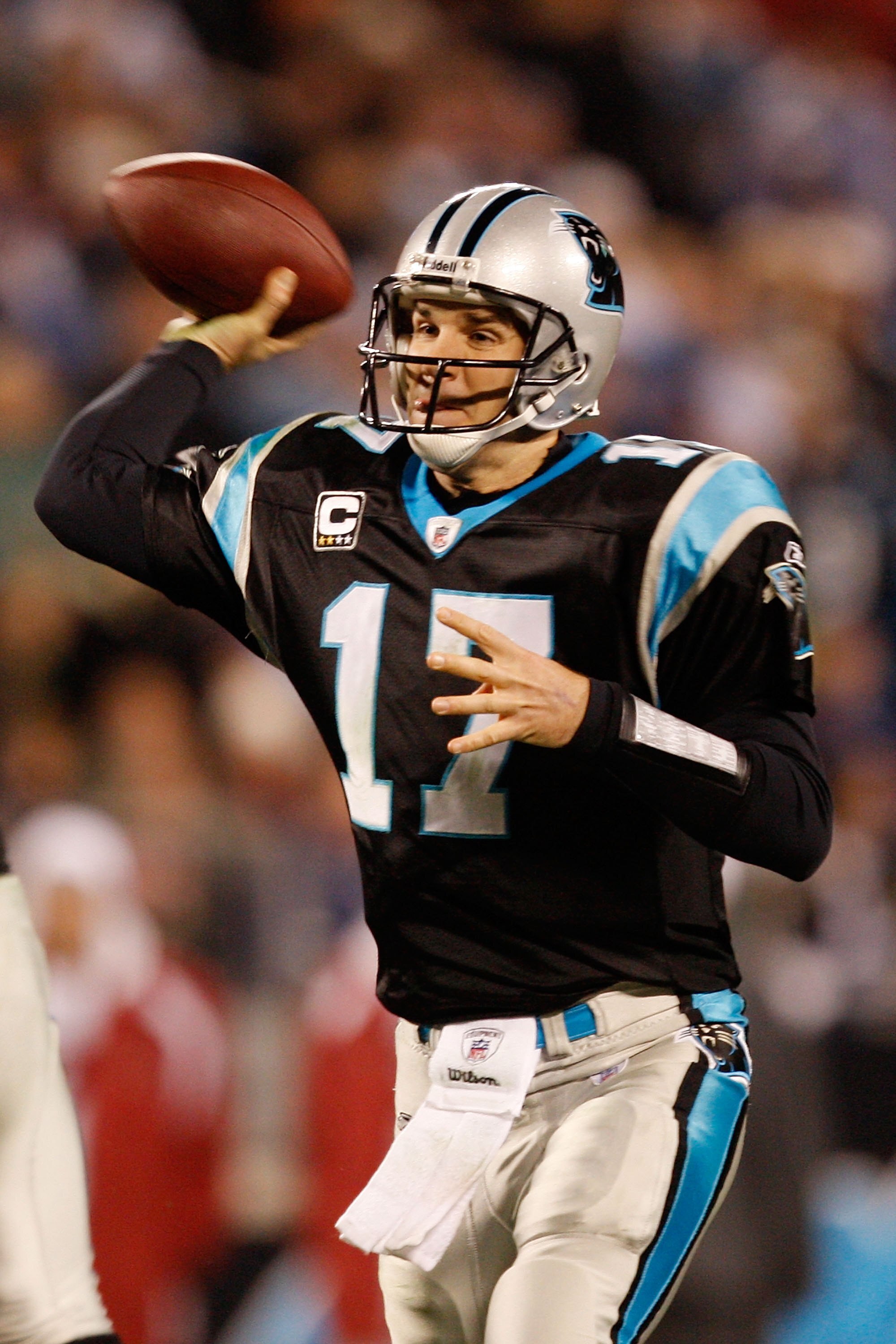 CHARLOTTE, NC - JANUARY 10:  Quarterback Jake Delhomme #17 of the Carolina Panthers passes the ball against the Arizona Cardinals during the NFC Divisional Playoff Game on January 10, 2009 at Bank of America Stadium in Charlotte, North Carolina.  (Photo b