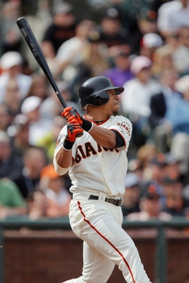 SAN FRANCISCO, CA - MAY 22:  Emmanuel Burriss #2 of the San Francisco Giants bats against the Oakland A's at AT&T Park on May 22, 2011 in San Francisco, California.  The Giants won 5-4.  (Photo by Brian Bahr/Getty Images)