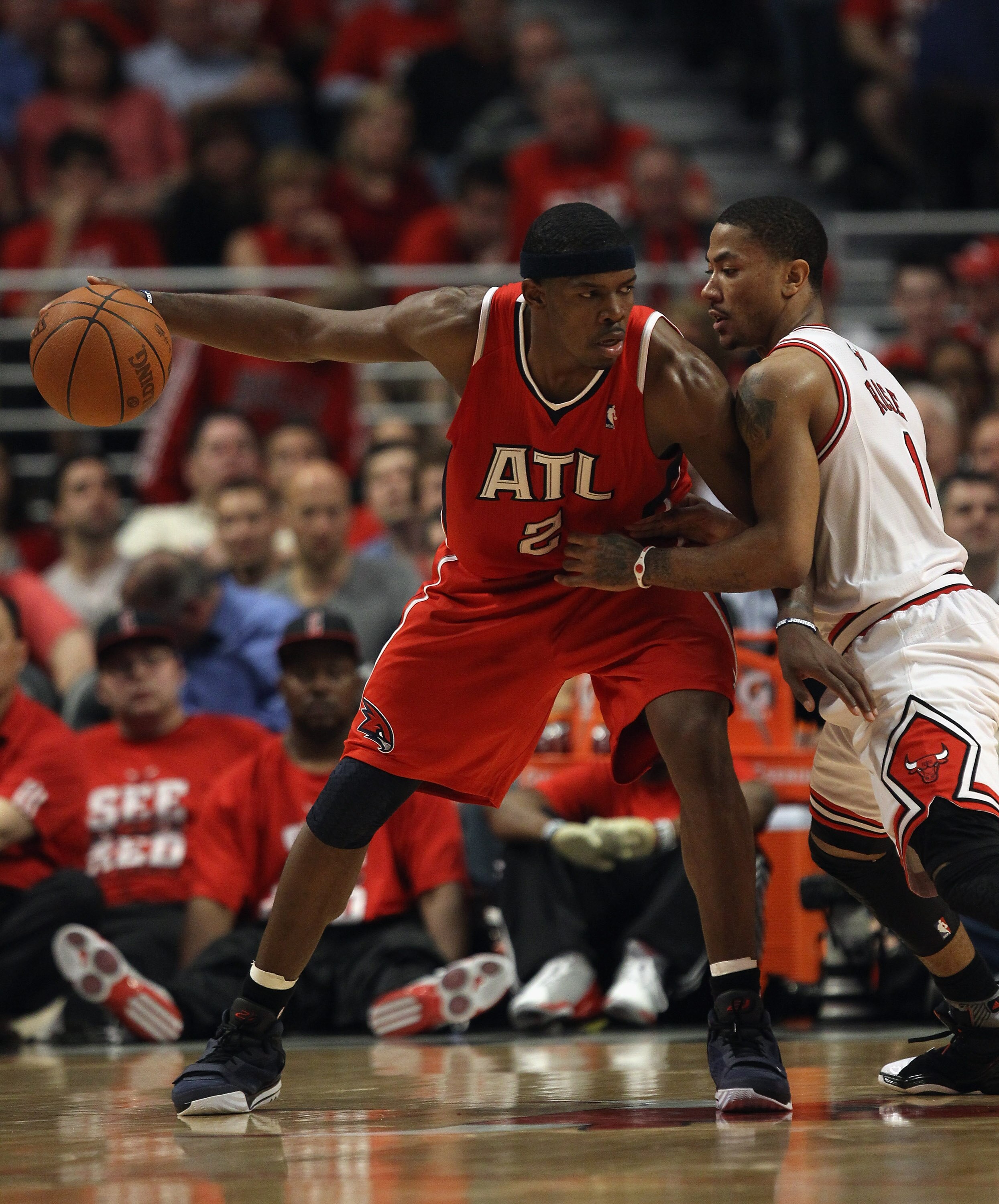 CHICAGO, IL - MAY 10: Joe Johnson #2 of the Atlanta Hawks moves against Derrick Rose #1 of the Chicago Bulls in Game Five of the Eastern Conference Semifinals in the 2011 NBA Playoffs at the United Center on May 10, 2011 in Chicago, Illinois. The Bulls de