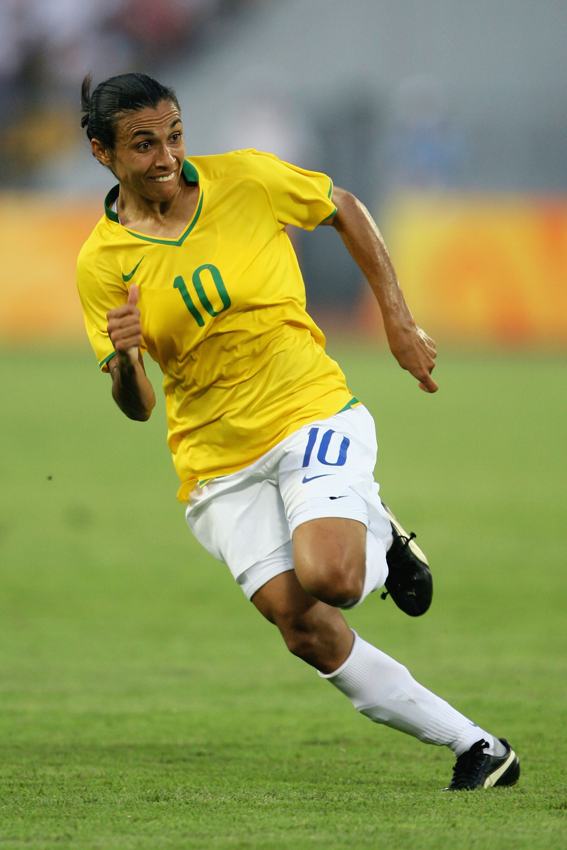BEIJING - AUGUST 12:  Marta of Brazil in action during the Women's First Round Group F match between Nigeria and Brazil at the Workers' Stadium on Day 4 of the Beijing 2008 Olympic Games on August 12, 2008 in Beijing, China.  (Photo by Jeff Gross/Getty Im