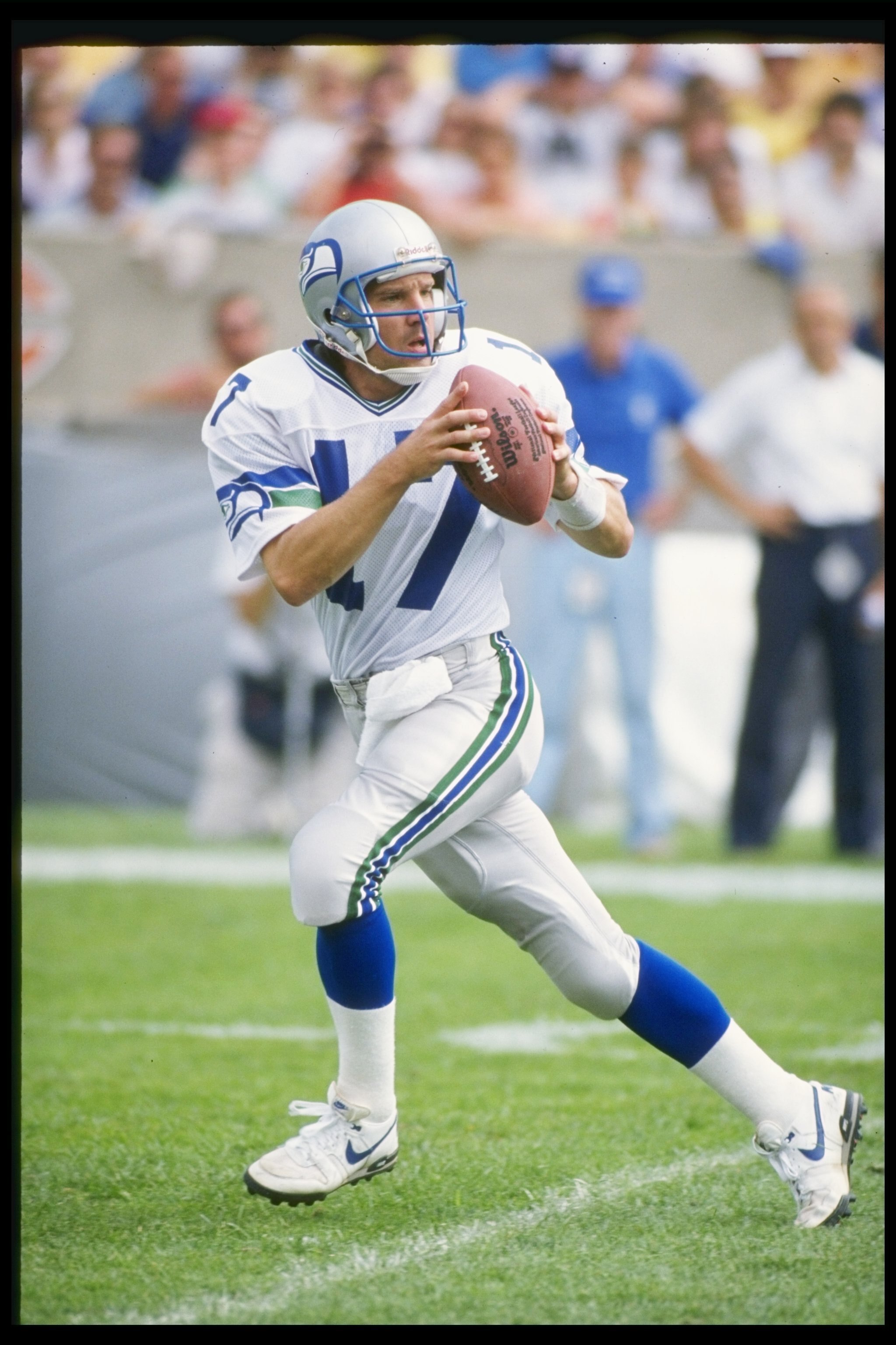 Quarterback Dave Krieg of the Seattle Seahawks looks to pass the ball during a game against the Chicago Bears at Soldier Field in Chicago, Illinois. The Bears won the game, 17-0.