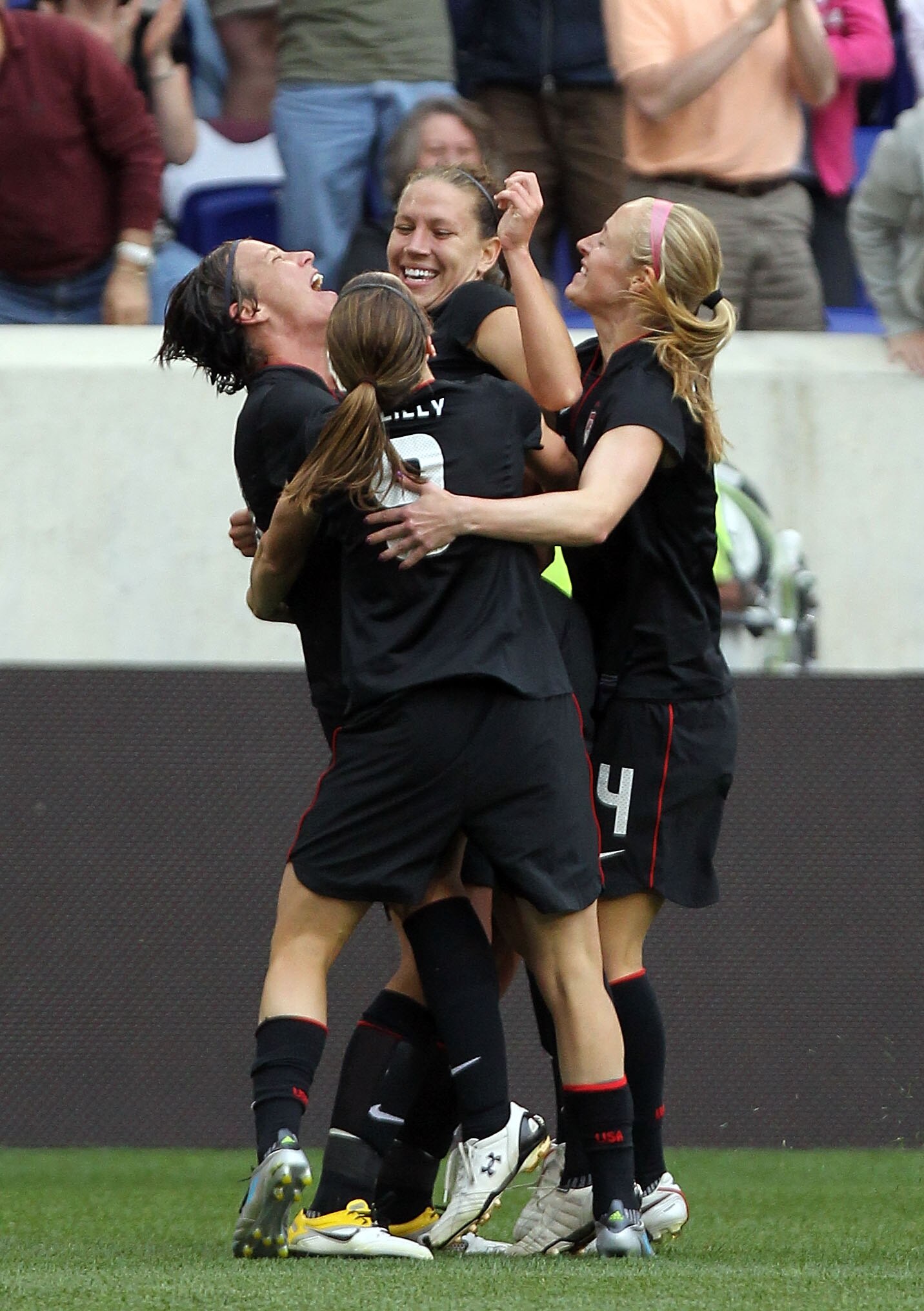 HARRISON, NJ - JUNE 05: (L-R) Abby Wambach #20, Heather O'Reilly #9, Lauren Cheney #12 and Becky Sauerbrunn #4 of the United States celebrate Cheney's goal against Mexico during their International Friendly at Red Bull Arena on June 5, 2011 in Harrison, N