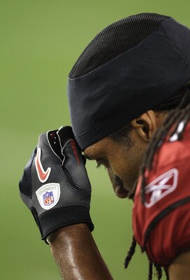 GLENDALE, AZ - DECEMBER 25:  Wide receiver Larry Fitzgerald #11 of the Arizona Cardinals during the NFL game against the Dallas Cowboys at the University of Phoenix Stadium on December 25, 2010 in Glendale, Arizona. The Cardinals defeated the Cowboys 27-2