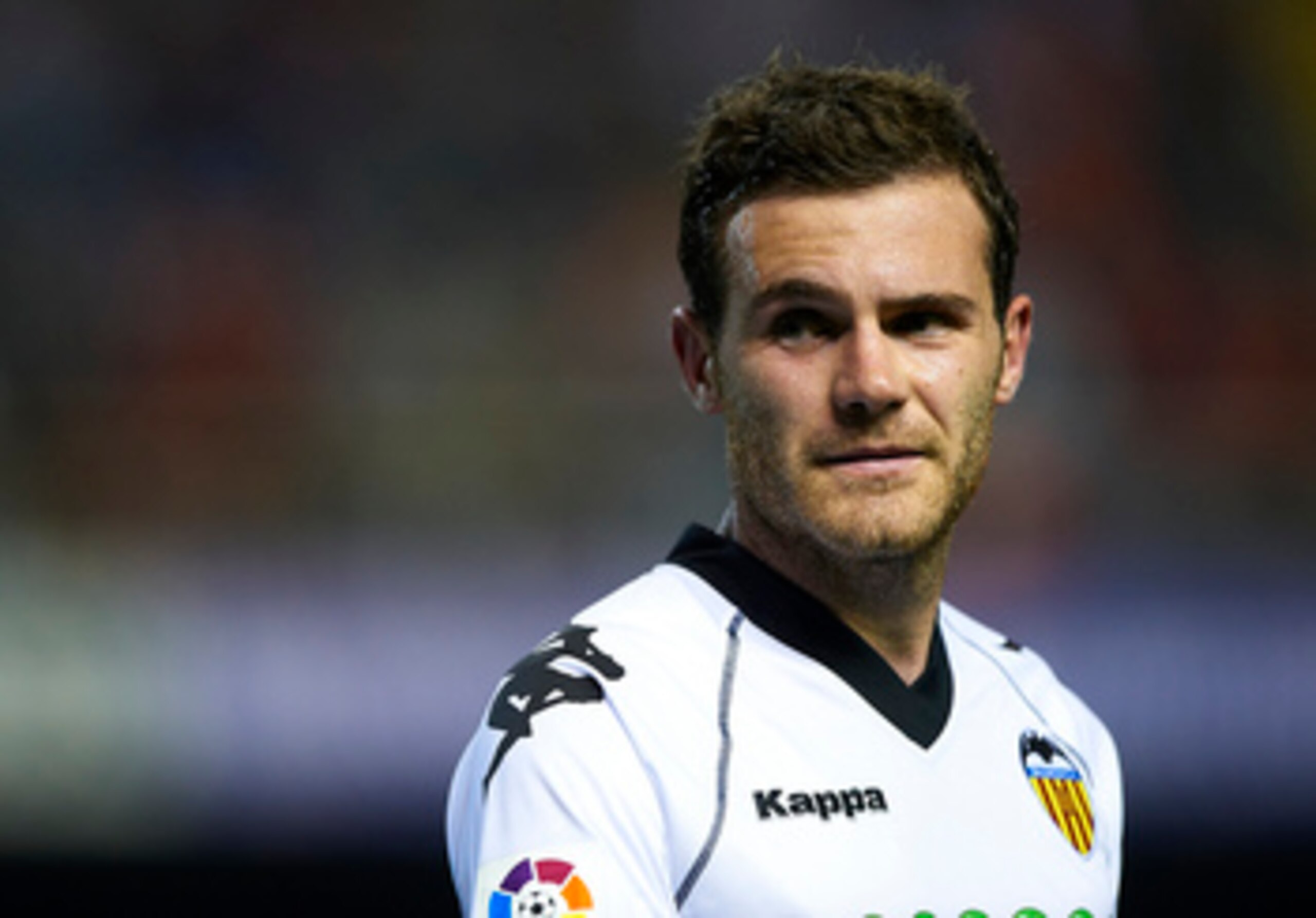 VALENCIA, SPAIN - APRIL 10:  Juan Mata of Valencia looks on during the La Liga match between Valencia and Villarreal at Estadio Mestalla on April 10, 2011 in Valencia, Spain.  Valencia won 5-0.  (Photo by Manuel Queimadelos Alonso/Getty Images)