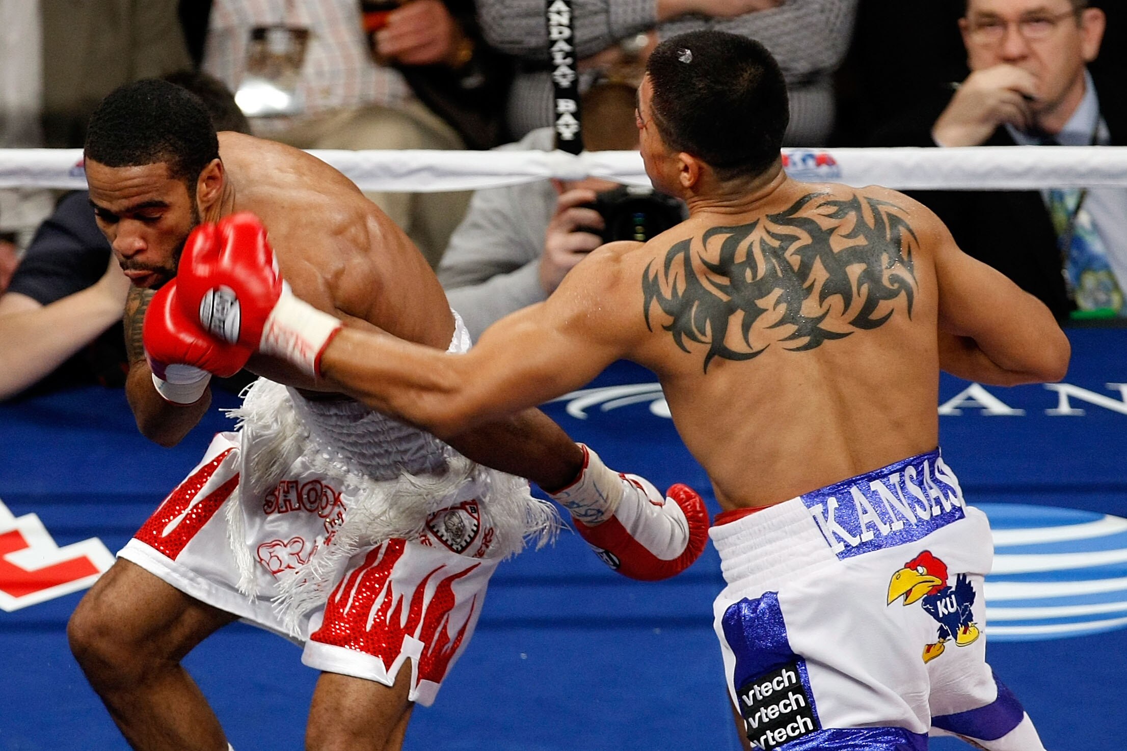 LAS VEGAS - DECEMBER 11:  (R-L) Victor Ortiz throws a left to the head of Lamont Petersen during the super lightweight fight at Mandalay Bay Events Center on December 11, 2010 in Las Vegas, Nevada.  (Photo by Ethan Miller/Getty Images)