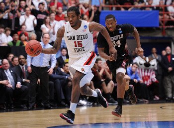 TUCSON, AZ - MARCH 19:  Kawhi Leonard #15 of the San Diego State Aztecs drives against the Temple Owls during the third round of the 2011 NCAA men's basketball tournament at McKale Center on March 19, 2011 in Tucson, Arizona.  (Photo by Harry How/Getty Im