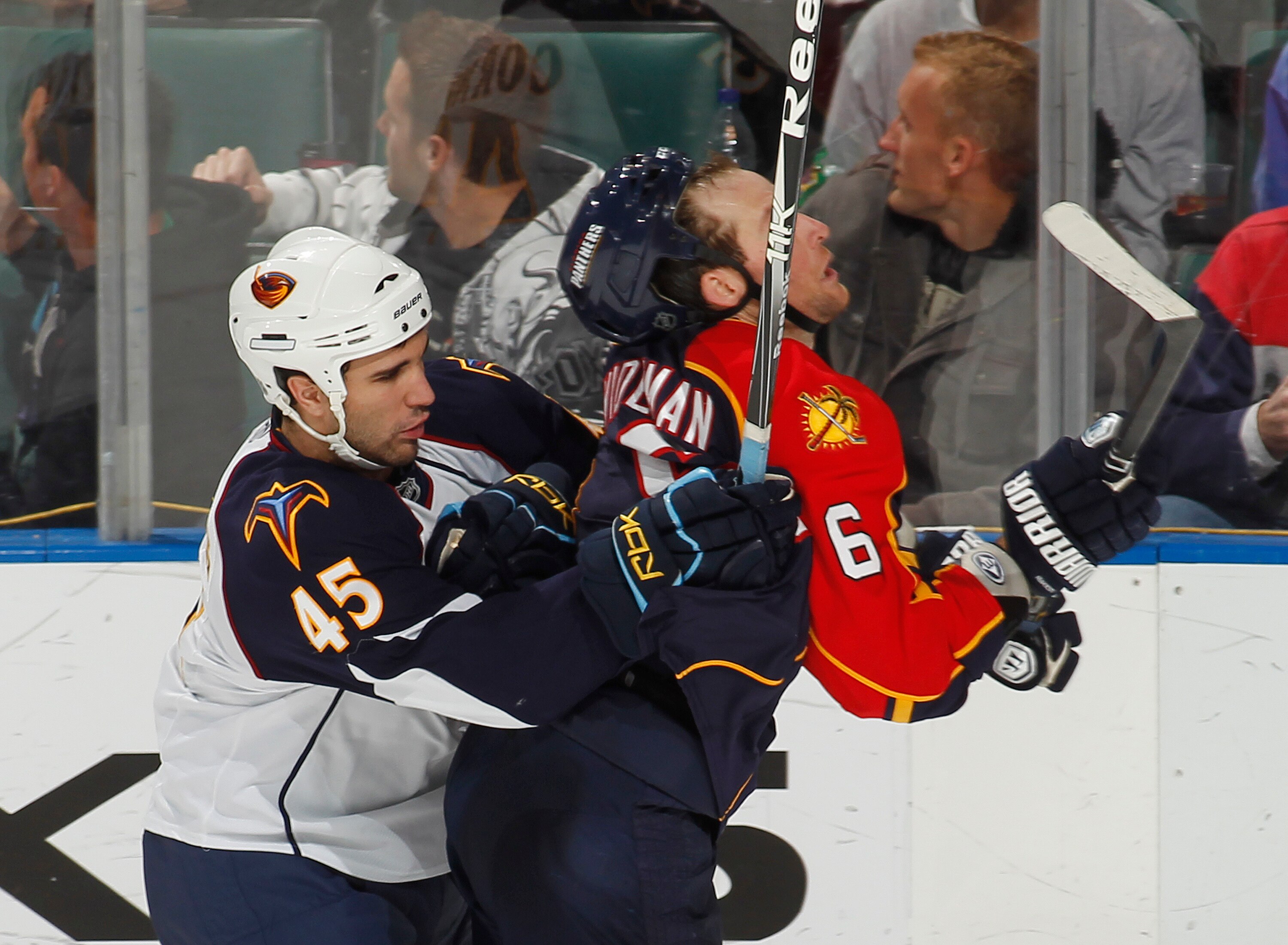 SUNRISE, FL - JANUARY 17: Patrice Cormier #45 of the Atlanta Thrashers checks Dennis Wideman #6 of the Florida Panthers on January 17, 2011 at the BankAtlantic Center in Sunrise, Florida. The Thrashers defeated the Panthers 3-2 in a shoot out. (Photo by J