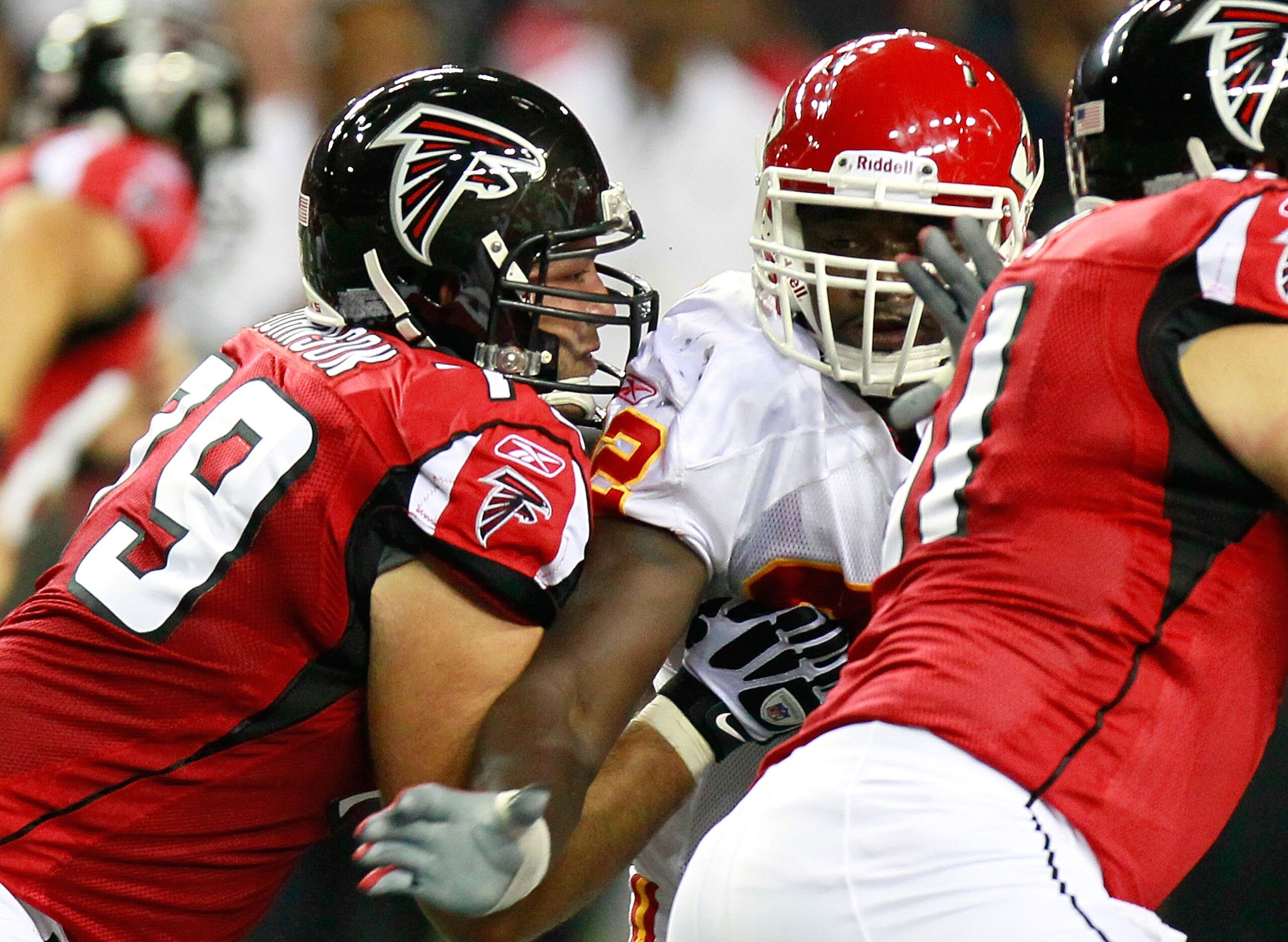 ATLANTA - AUGUST 13:  Mike Johnson #79 of the Atlanta Falcons against Wallace Gilberry #92 of the Kansas City Chiefs at Georgia Dome on August 13, 2010 in Atlanta, Georgia.  (Photo by Kevin C. Cox/Getty Images)