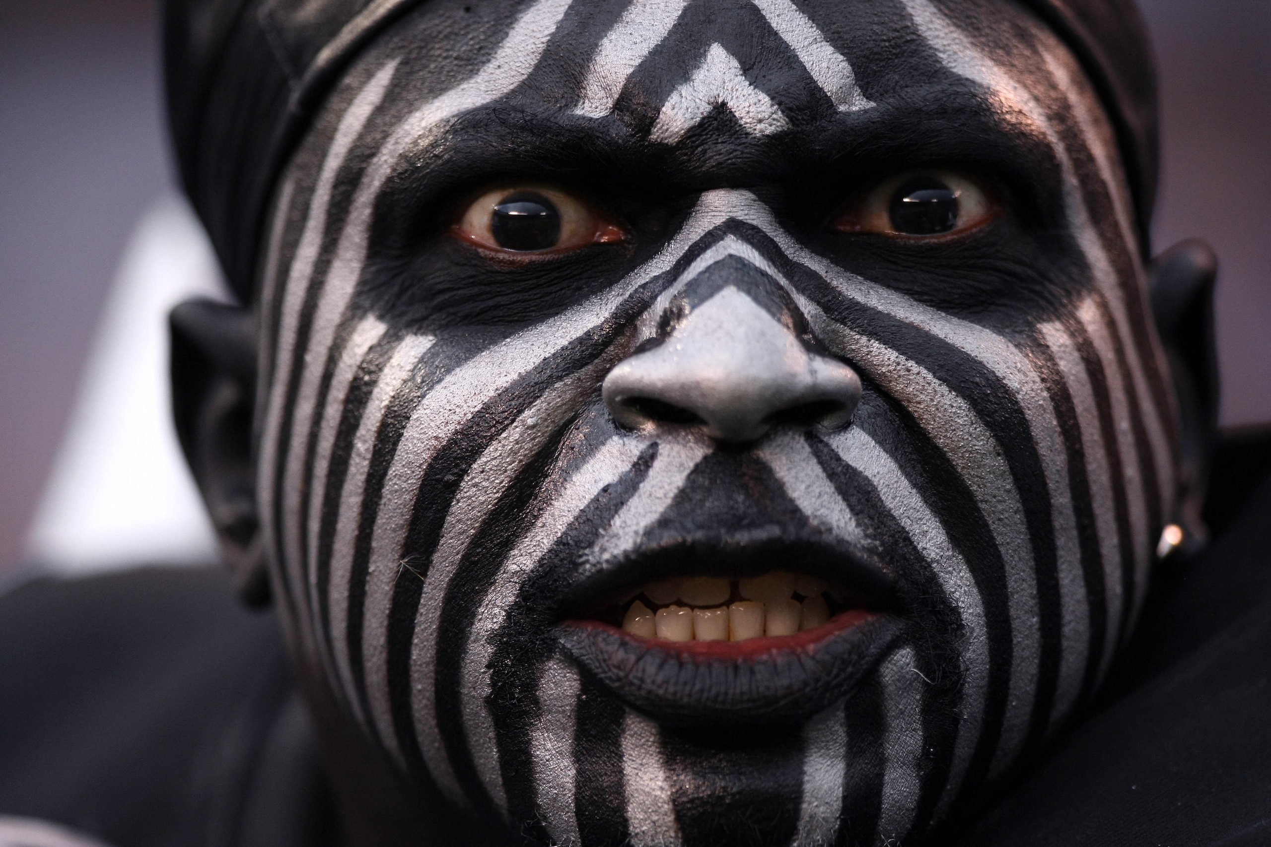 SAN DIEGO, CA - DECEMBER 5: A fan of the Oakland Raiders looks on during their NFL game at Qualcomm Stadium on December 5, 2010 in San Diego, California. (Photo by Donald Miralle/Getty Images)
