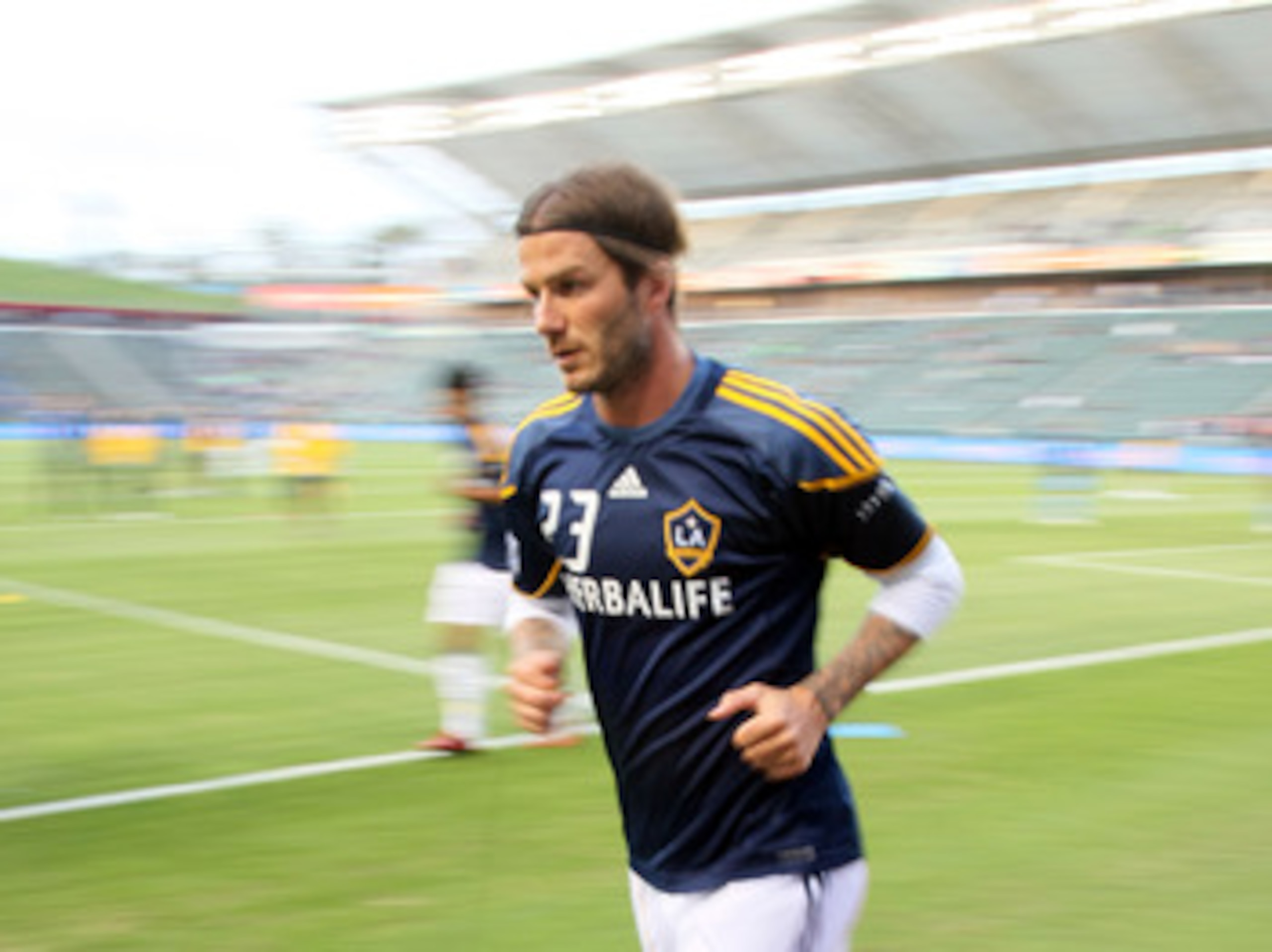 CARSON, CA - JUNE 03:  David Beckham #23 of the Los Angeles Galaxy jogs during warm-up prior to their MLS match against D.C. United at The Home Depot Center on June 3, 2011 in Carson, California. United and the Galaxy played to a 0-0 draw.  (Photo by Vict