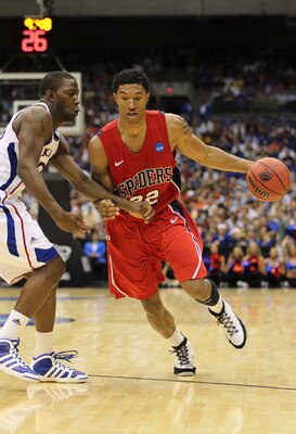 SAN ANTONIO, TX - MARCH 25:  Justin Harper #32 of the Richmond Spiders drives against the Kansas Jayhawks during the southwest regional of the 2011 NCAA men's basketball tournament at the Alamodome on March 25, 2011 in San Antonio, Texas. Kansas defeated 