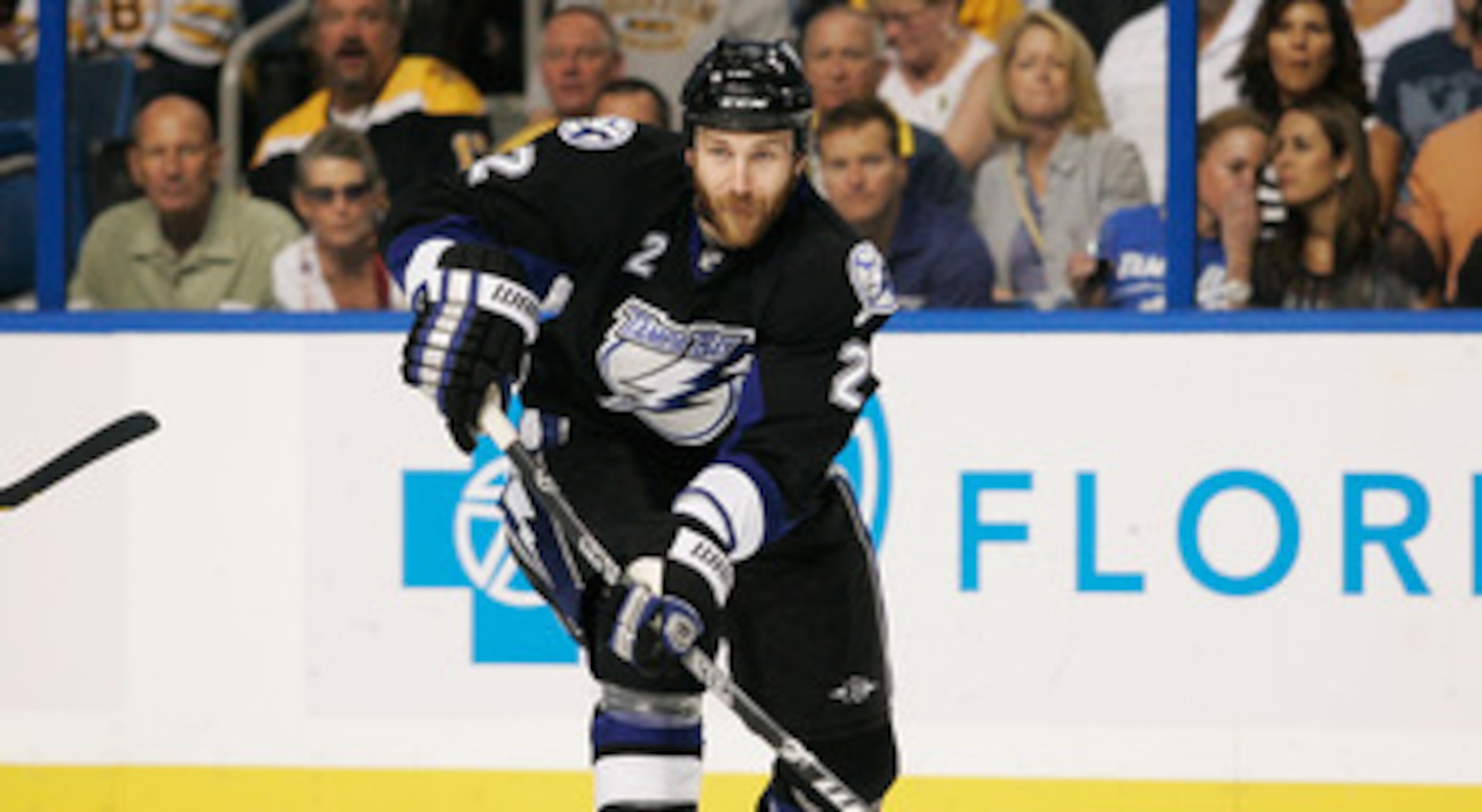 TAMPA, FL - MAY 21:  Eric Brewer #2 of the Tampa Bay Lightning controls the puck in Game Four of the Eastern Conference Finals against the Boston Bruins during the 2011 NHL Stanley Cup Playoffs at St Pete Times Forum on May 21, 2011 in Tampa, Florida.  (P