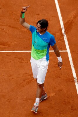 PARIS - JUNE 06:  Rafael Nadal of Spain celebrates winning championship point during the men's singles final match between Rafael Nadal of Spain and Robin Soderling of Sweden on day fifteen of the French Open at Roland Garros on June 6, 2010 in Paris, Fra