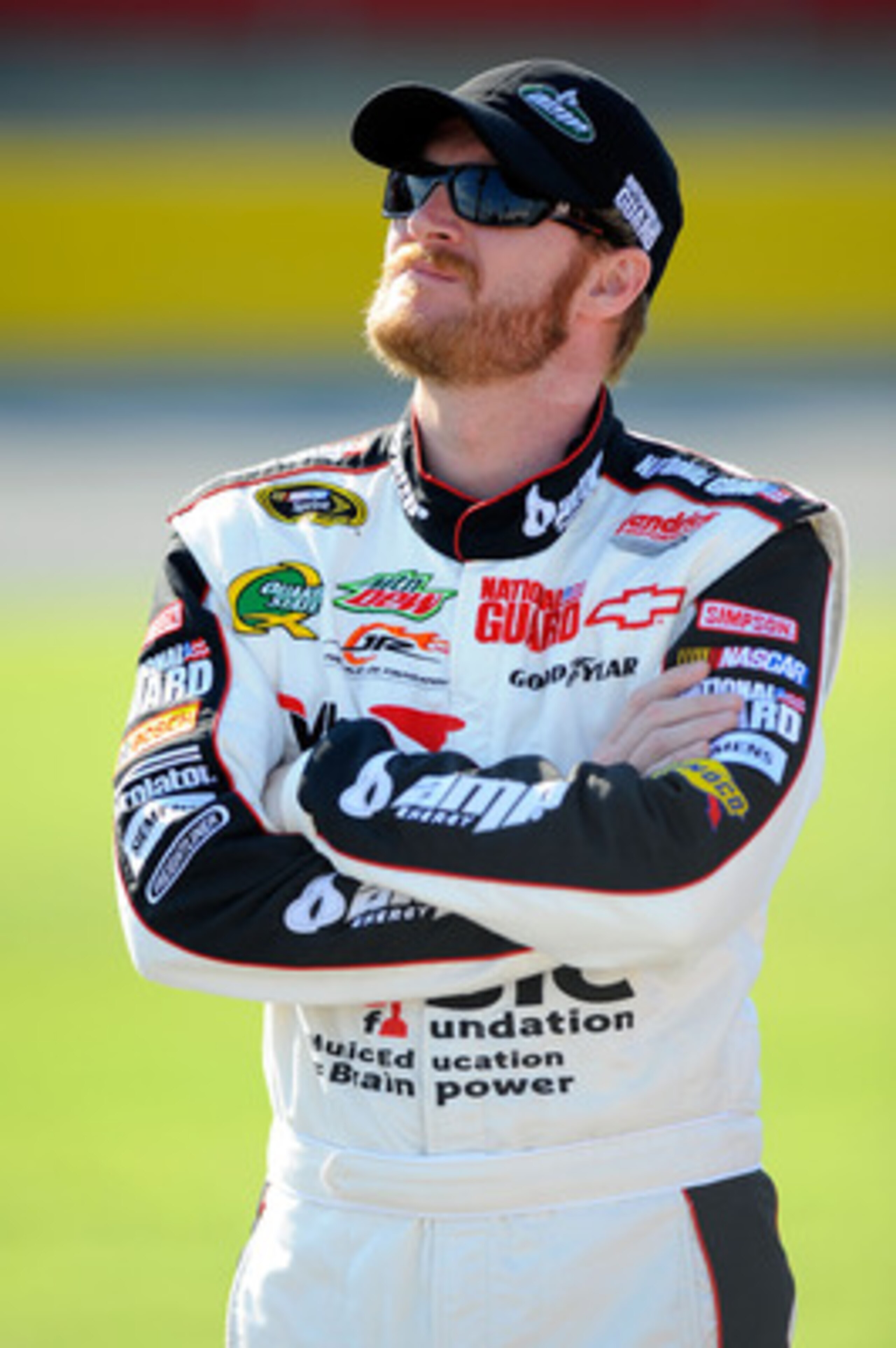 CHARLOTTE, NC - MAY 20:  Dale Earnhardt Jr., driver of the #88 Dale Jr. Foundation/VH1 Save the Music/Amp Energy Sugar-Free/National Guard Chevrolet, stands on pit road during qualifying for the NASCAR Sprint Showdown at Charlotte Motor Speedway on May 20