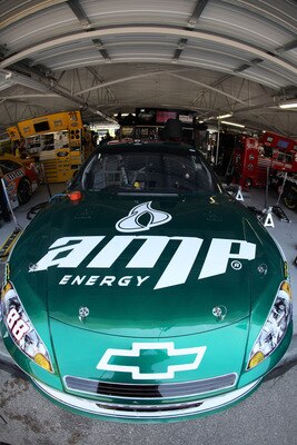 KANSAS CITY, KS - JUNE 03:  The #88 Amp Energy/National Guard Chevrolet of Dale Earnhardt Jr. sits in the garage area during practice for the NASCAR Sprint Cup Series STP 400 at Kansas Speedway on June 3, 2011 in Kansas City, Kansas.  (Photo by Jamie Squi