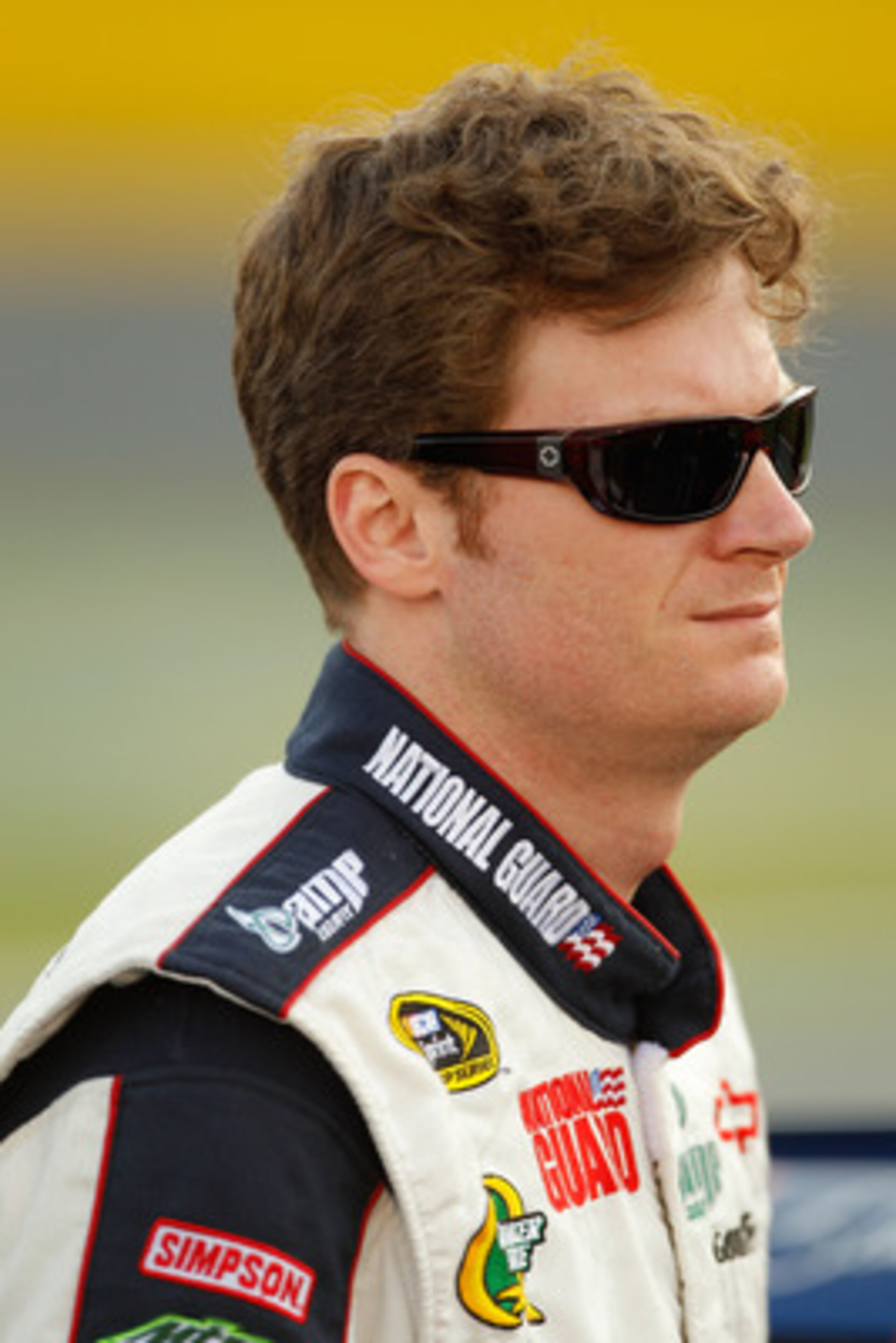 CHARLOTTE, NC - MAY 26:  Dale Earnhardt Jr., driver of the #88 National Guard/Amp Energy Chevrolet, walks on the grid during qualifying for the NASCAR Sprint Cup Series Coca-Cola 600 at Charlotte Motor Speedway on May 26, 2011 in Charlotte, North Carolina