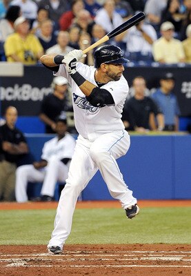 TORONTO, ON - SEPTEMBER 22: Jose Bautista #19 of the Toronto Blue Jays prepares to swing at the ball during a game against the Seattle Mariners on September 22, 2010 in Toronto, Canada. (Photo by Matthew Manor/Getty Images)