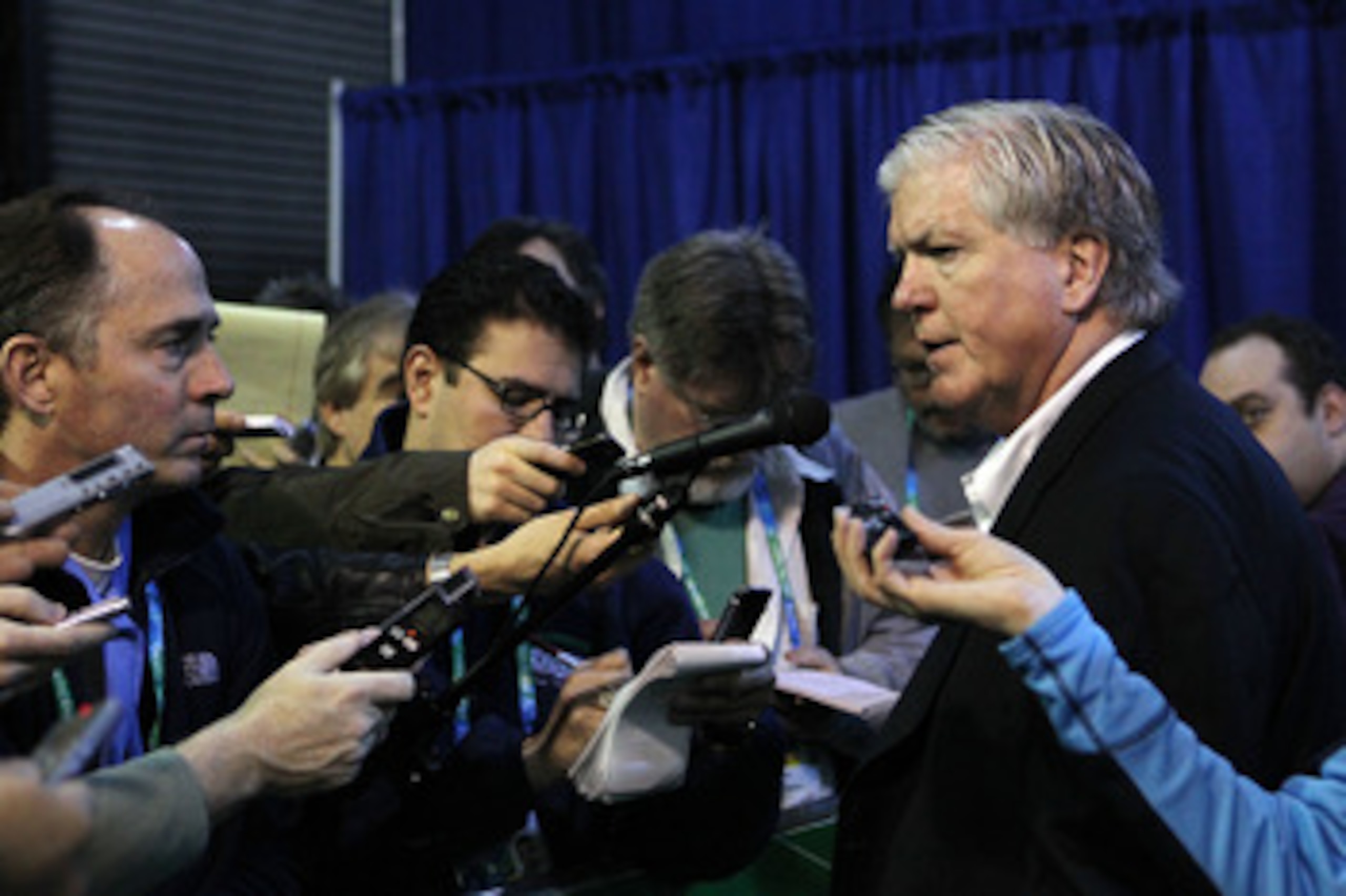 VANCOUVER, BC - FEBRUARY 22:  Hockey USA General Manager and Toronto Maple Leafs GM Brian Burke (R) speaks to the media prior to the start of the Women's USA vs. Sweden  women's semifinal game on day 11 of the Vancouver 2010 Winter Olympics at Canada Hock