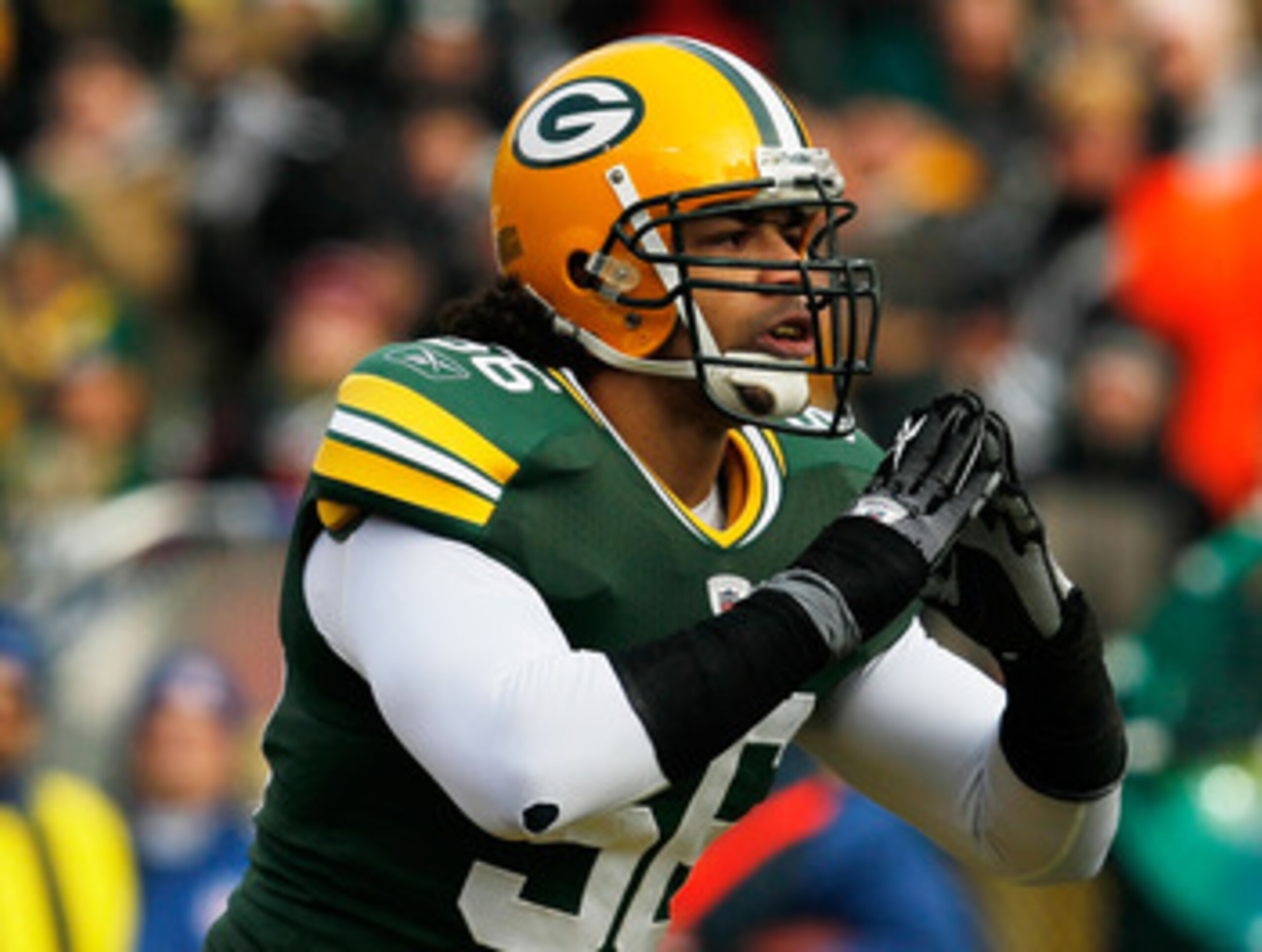 GREEN BAY, WI - DECEMBER 27: Nick Barnett #56 of the Green Bay Packers takes a bow for the fans after sacking Matt Hasselbeck of the Seattle Seahawks at Lambeau Field on December 27, 2009 in Green Bay, Wisconsin. The Packers defeated the Seahawks 48-10. ( GREEN BAY, WI - DECEMBER 27: Nick Barnett #56 of the Green Bay Packers takes a bow for the fans after sacking Matt Hasselbeck of the Seattle Seahawks at Lambeau Field on December 27, 2009 in Green Bay, Wisconsin. The Packers defeated the Seahawks 48-10. (