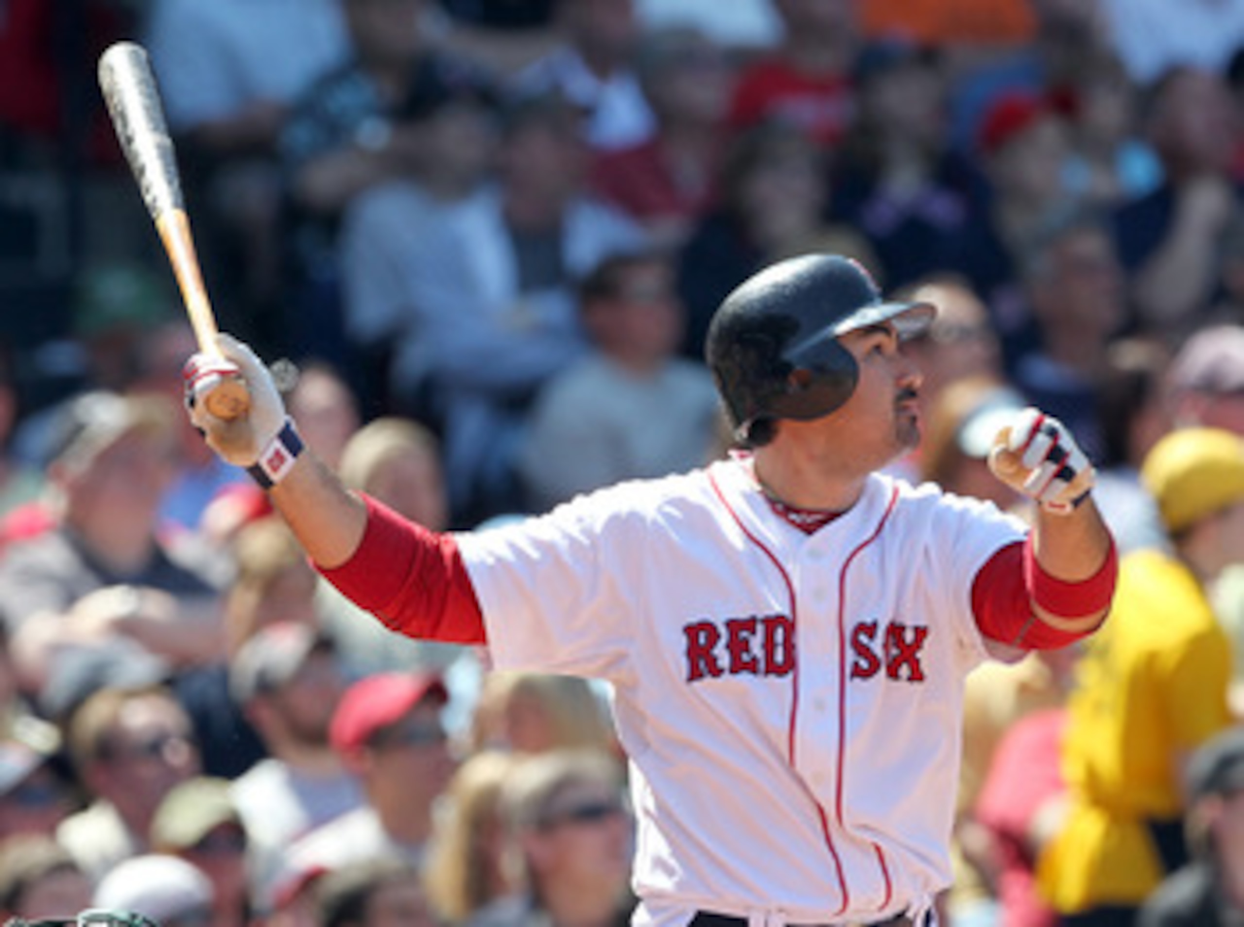 BOSTON, MA - JUNE 5:  Adrian Gonzalez #28 of the Boston Red Sox hits a home run against the Oakland Athletics at Fenway Park on June 5, 2011 in Boston, Massachusetts.  (Photo by Jim Rogash/Getty Images)