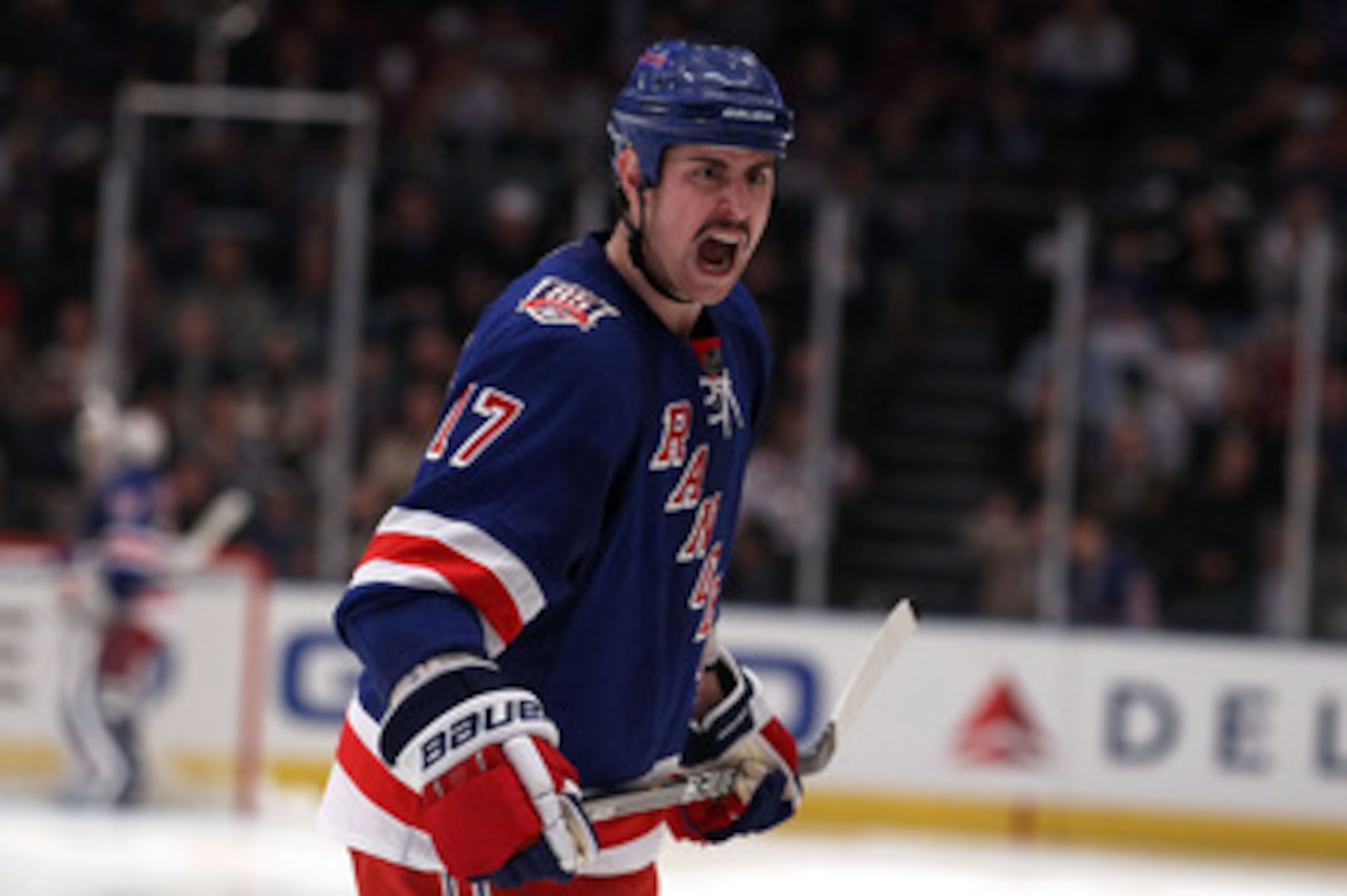 NEW YORK, NY - APRIL 20:  Brandon Dubinsky #17 of the New York Rangers yells back at referee Paul Devorski #10 after Dubinsky thought Devorski blocked him on a break away attempt against the Washington Capitals in Game Four of the Eastern Conference Quart