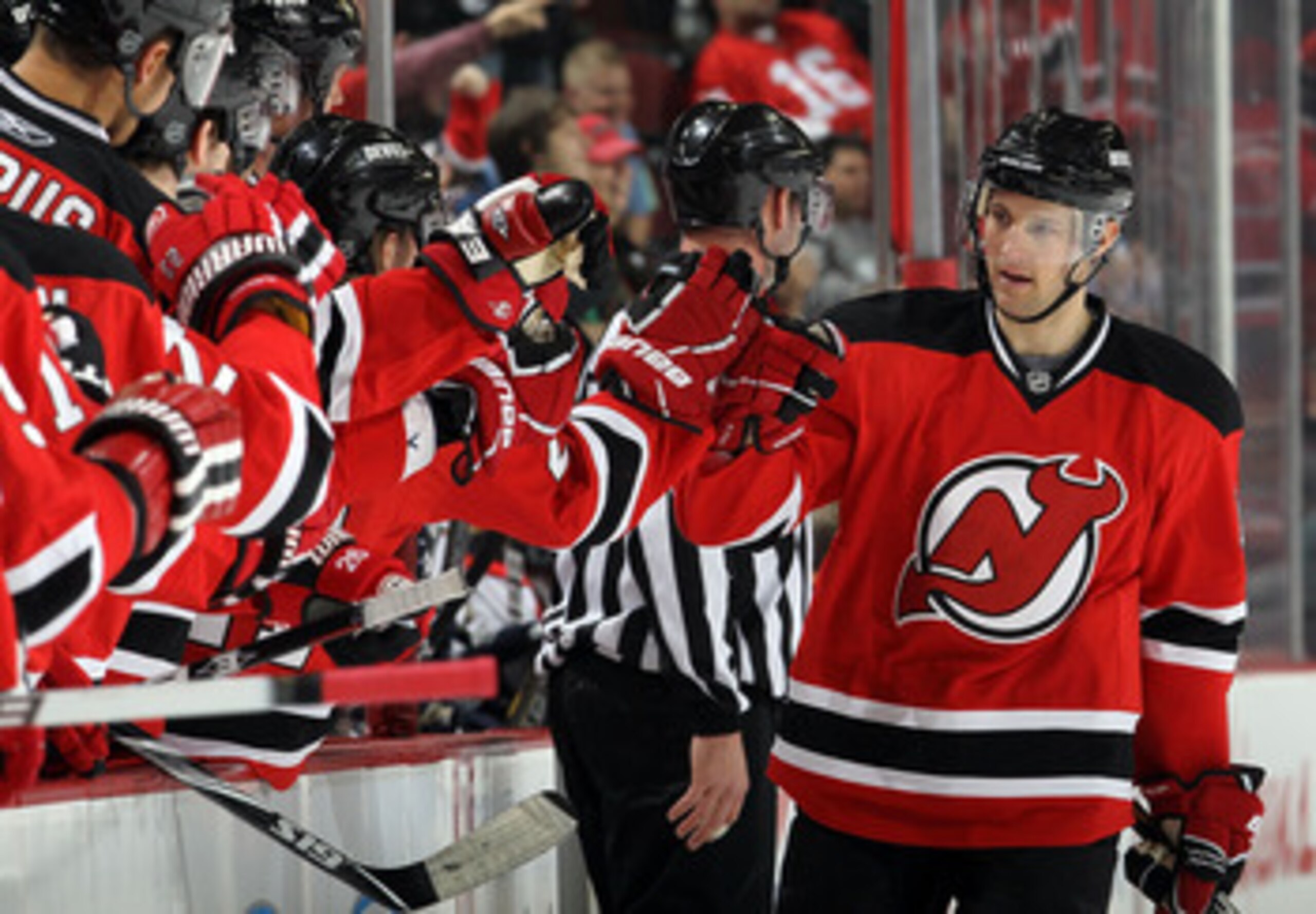 NEWARK, NJ - FEBRUARY 04:  Travis Zajac #19 of the New Jersey Devils celebrates his first period goal against the Florida Panthers at the Prudential Center on February 4, 2011 in Newark, New Jersey.  (Photo by Jim McIsaac/Getty Images)