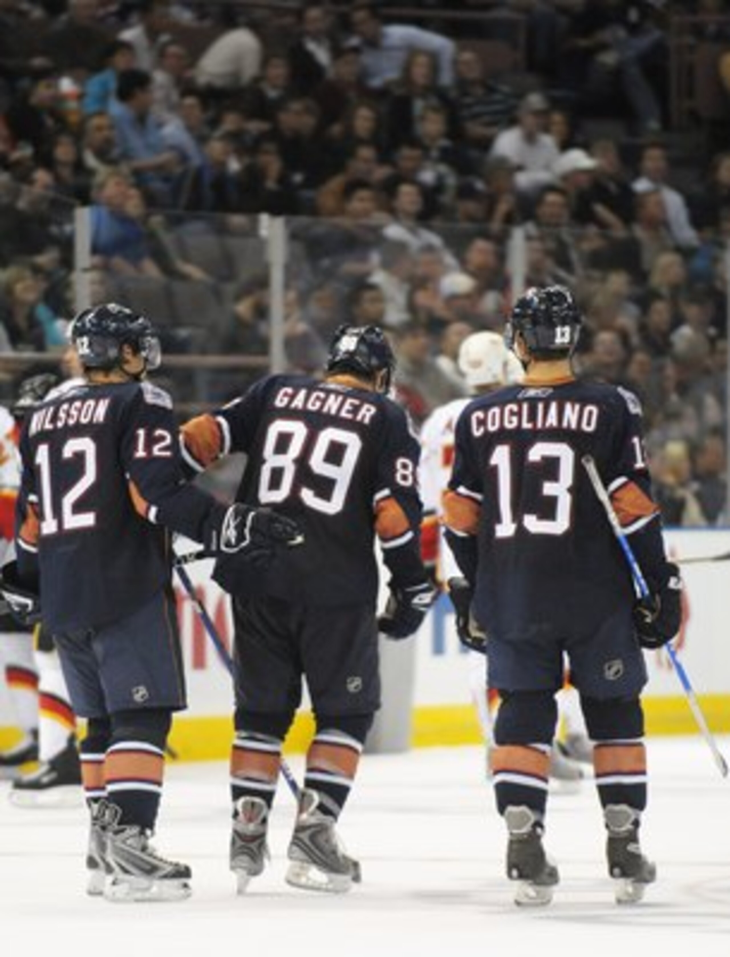 EDMONTON, AB - SEPTEMBER 30:  Known as the kid line, are Robert Nilsson #12, Sam Gagner #89 and Andrew Cogliano #13 of the Edmonton Oilers skate in a game against the Calgary Flames in the third period during a preseason NHL game on September 30, 2008 at 