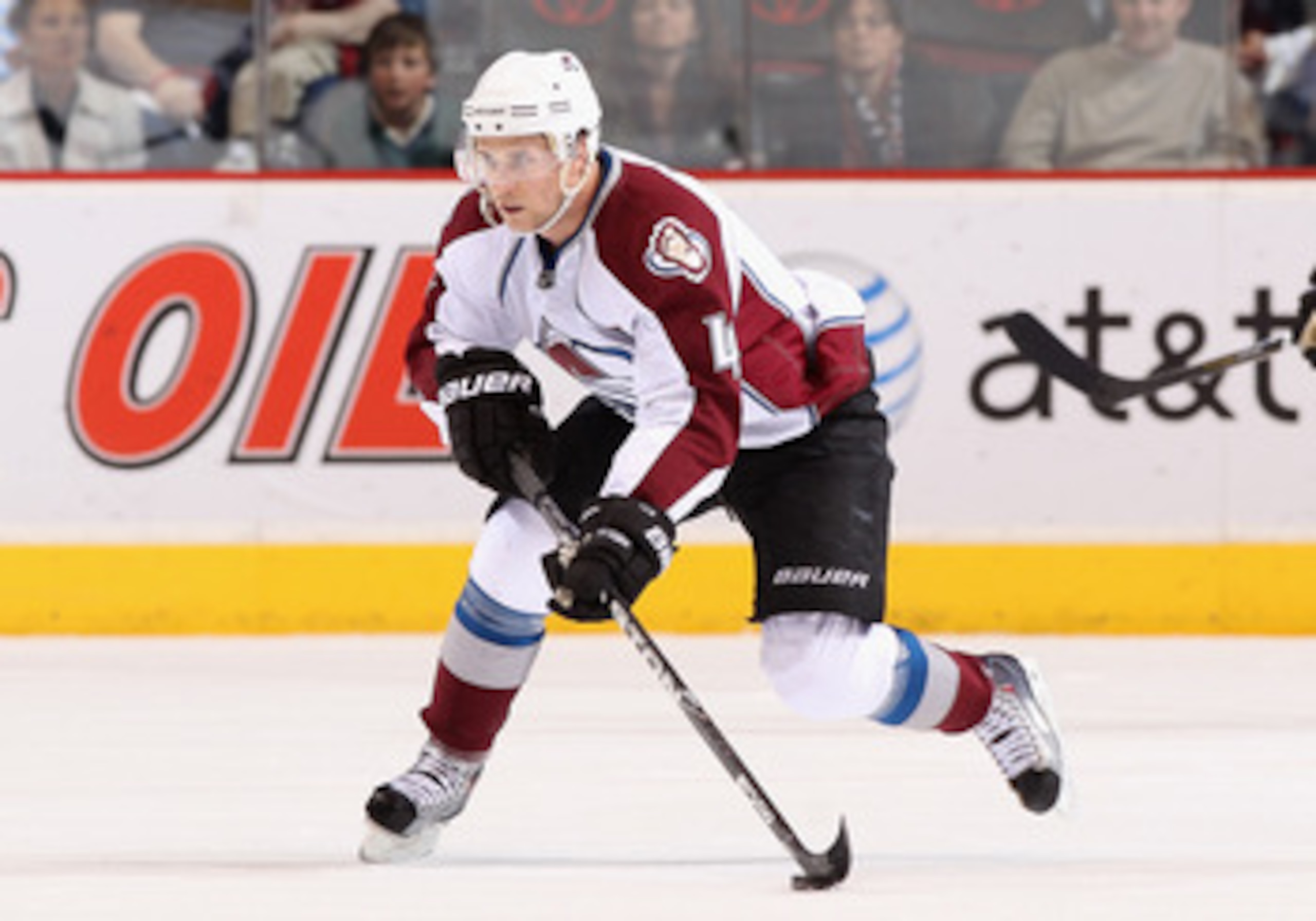 GLENDALE, AZ - APRIL 01:  John-Michael Liles #4 of the Colorado Avalanche skates with the puck during the NHL game against the Phoenix Coyotes at Jobing.com Arena on April 1, 2011 in Glendale, Arizona.  The Avalanche defeated the Coyotes 4-3 in an overtim