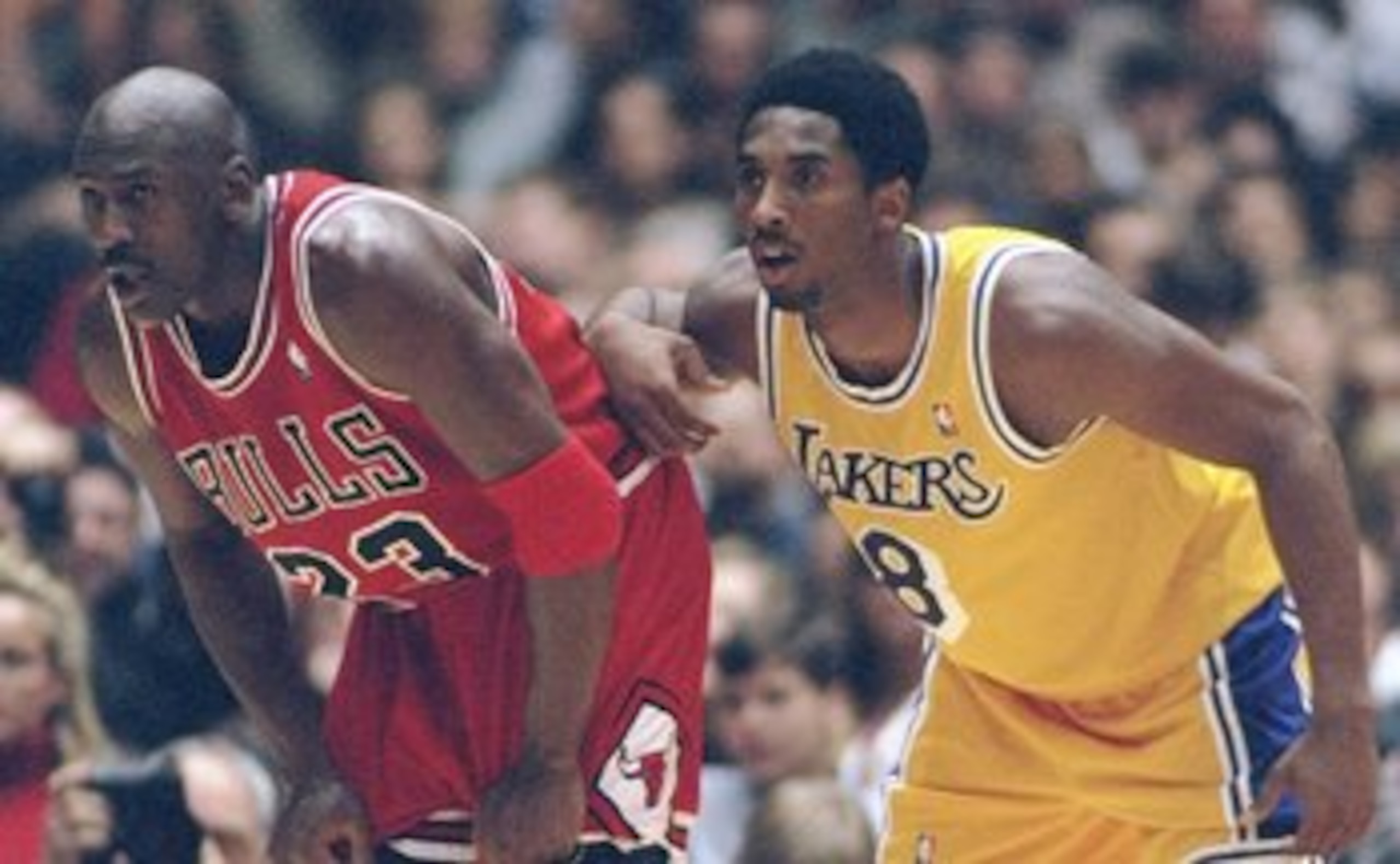 1 Feb 1998:  Guard Michael Jordan of the Chicago Bulls (left) and guard Kobe Bryant of the Los Angeles Lakers look on during a game at the Great Western Forum in Inglewood, California.  The Lakers won the game, 112-87. Mandatory Credit: Jed Jacobsohn  /Al