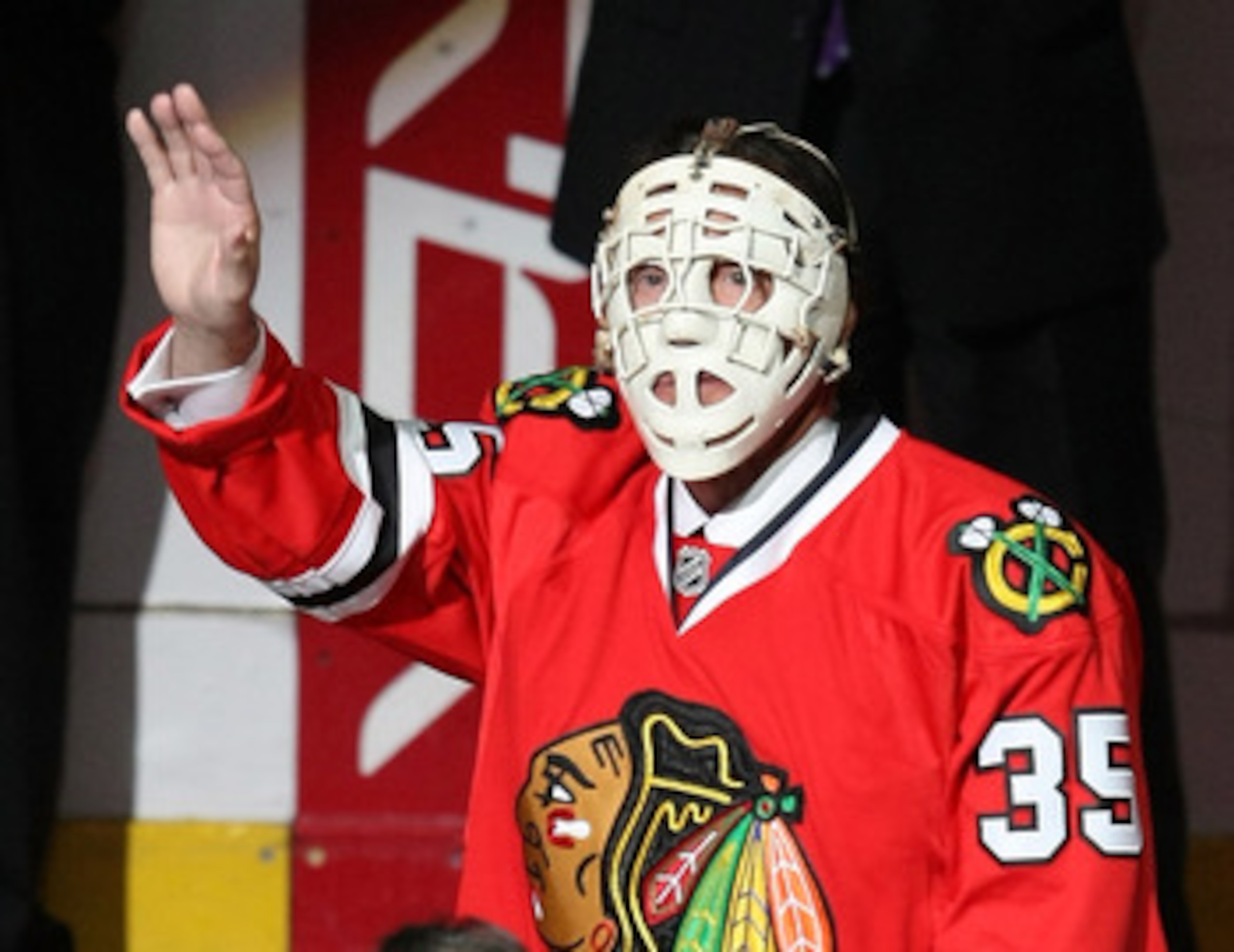 CHICAGO - MARCH 19: Former goaltender Tony Esposito of the Chicago Blackhawks dones his old face mask and waves to the crowd during a ceremony before a game between the Blackhawks and the Washington Capitals on March 19, 2008 at the United Center in Chica CHICAGO - MARCH 19: Former goaltender Tony Esposito of the Chicago Blackhawks dones his old face mask and waves to the crowd during a ceremony before a game between the Blackhawks and the Washington Capitals on March 19, 2008 at the United Center in Chica