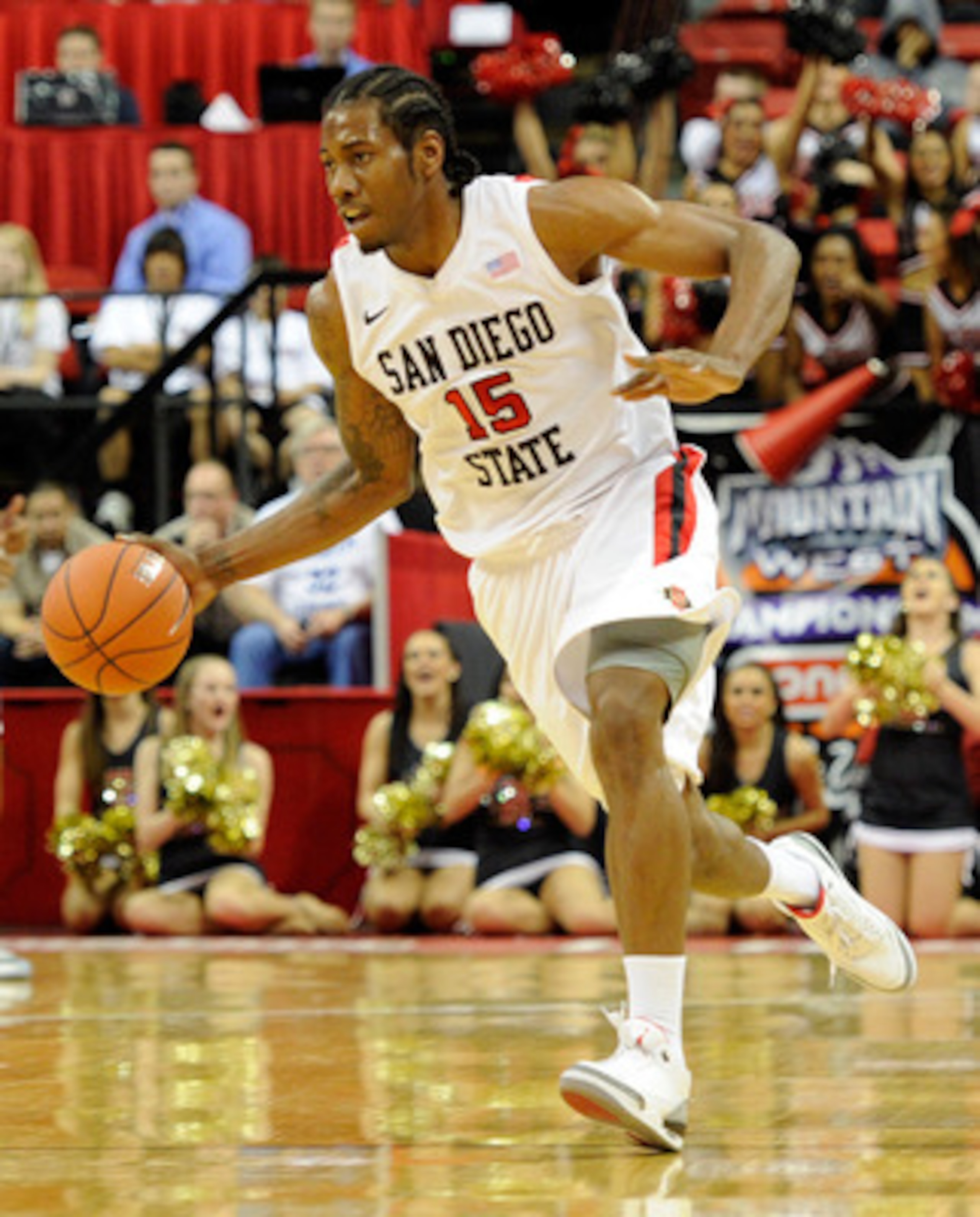 LAS VEGAS, NV - MARCH 10:  Kawhi Leonard #15 of the San Diego State Aztecs brings the ball up the court during a quarterfinal game of the Conoco Mountain West Conference Basketball tournament against the Utah Utes at the Thomas & Mack Center March 10, 201