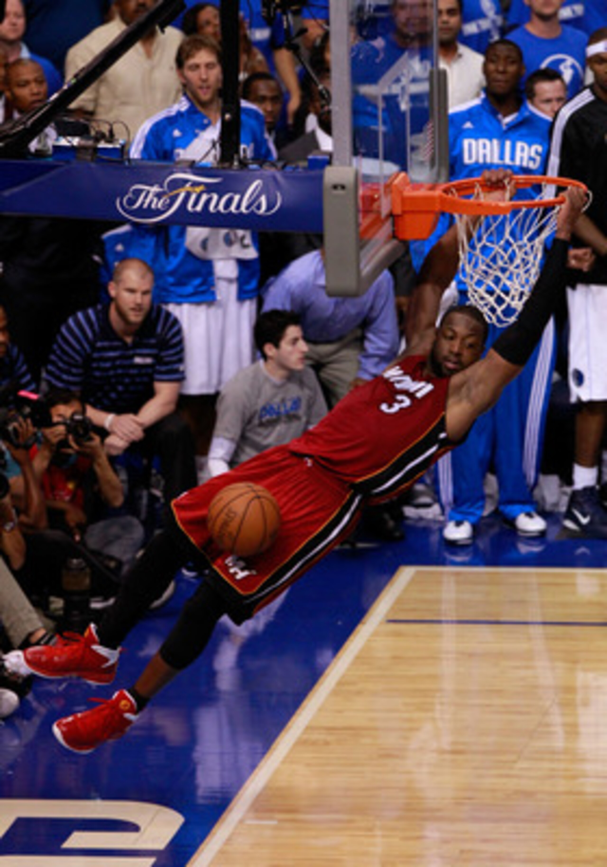 DALLAS, TX - JUNE 07:  Dwyane Wade #3 of the Miami Heat dunks in the final minute of the fourth quarter against the Dallas Mavericks in Game Four of the 2011 NBA Finals at American Airlines Center on June 7, 2011 in Dallas, Texas. The Mavericks won 86-83.